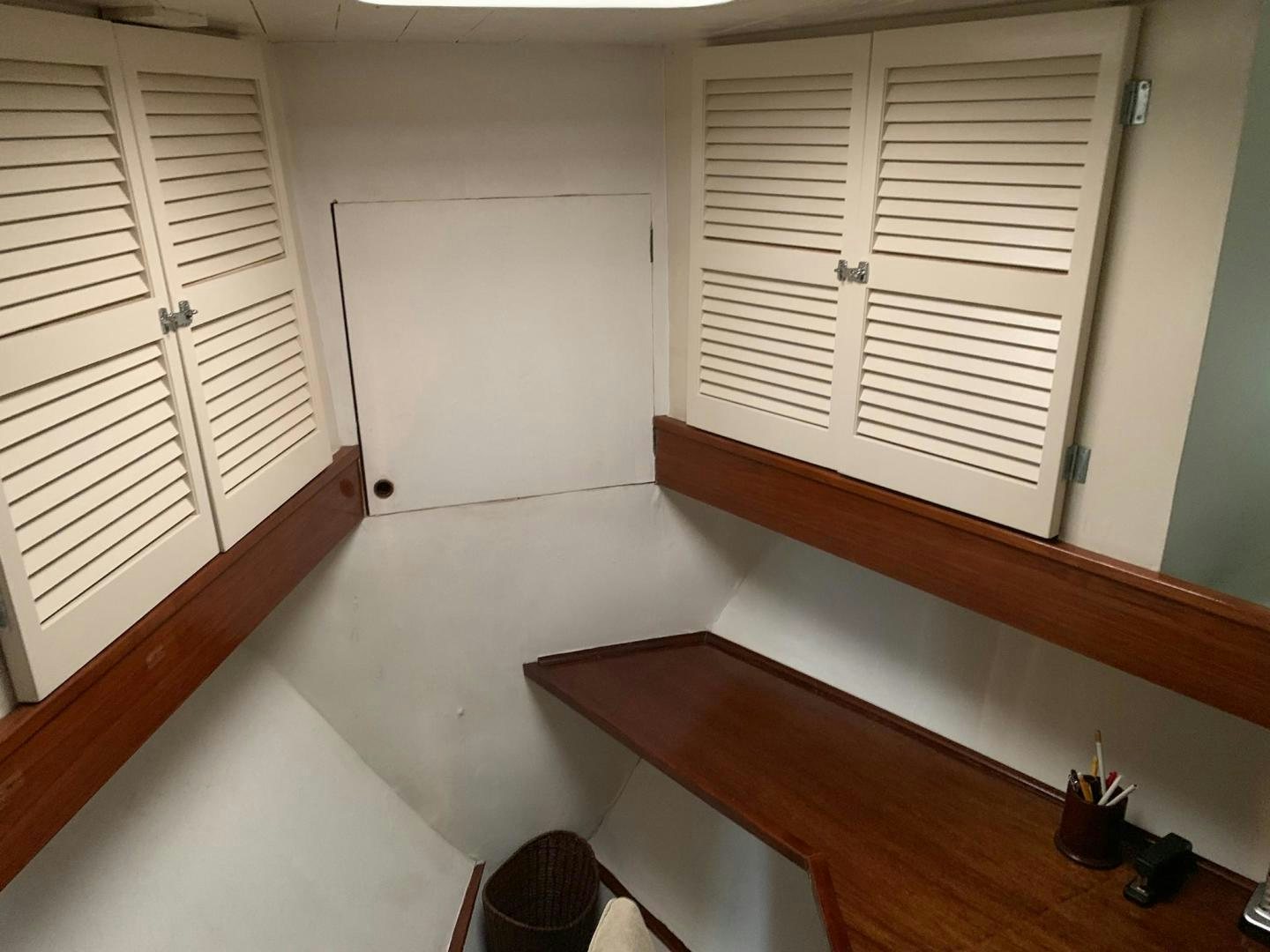 a room with white doors aboard No Name Yacht for Sale