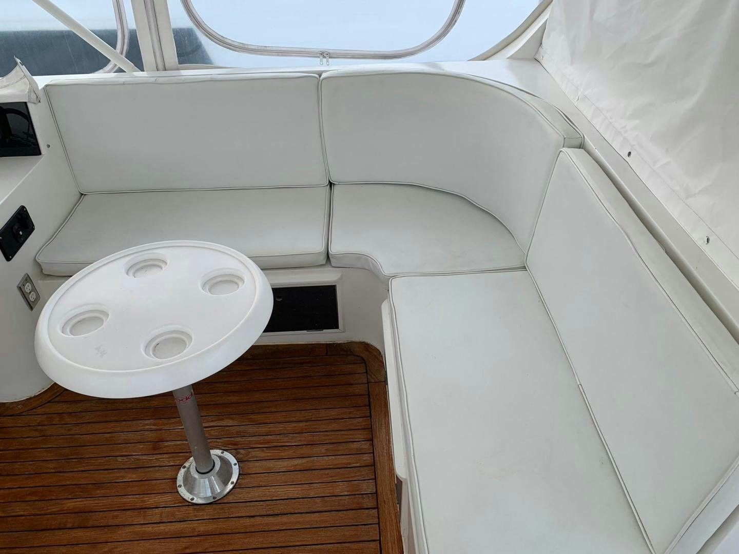 a white car with a white interior aboard No Name Yacht for Sale