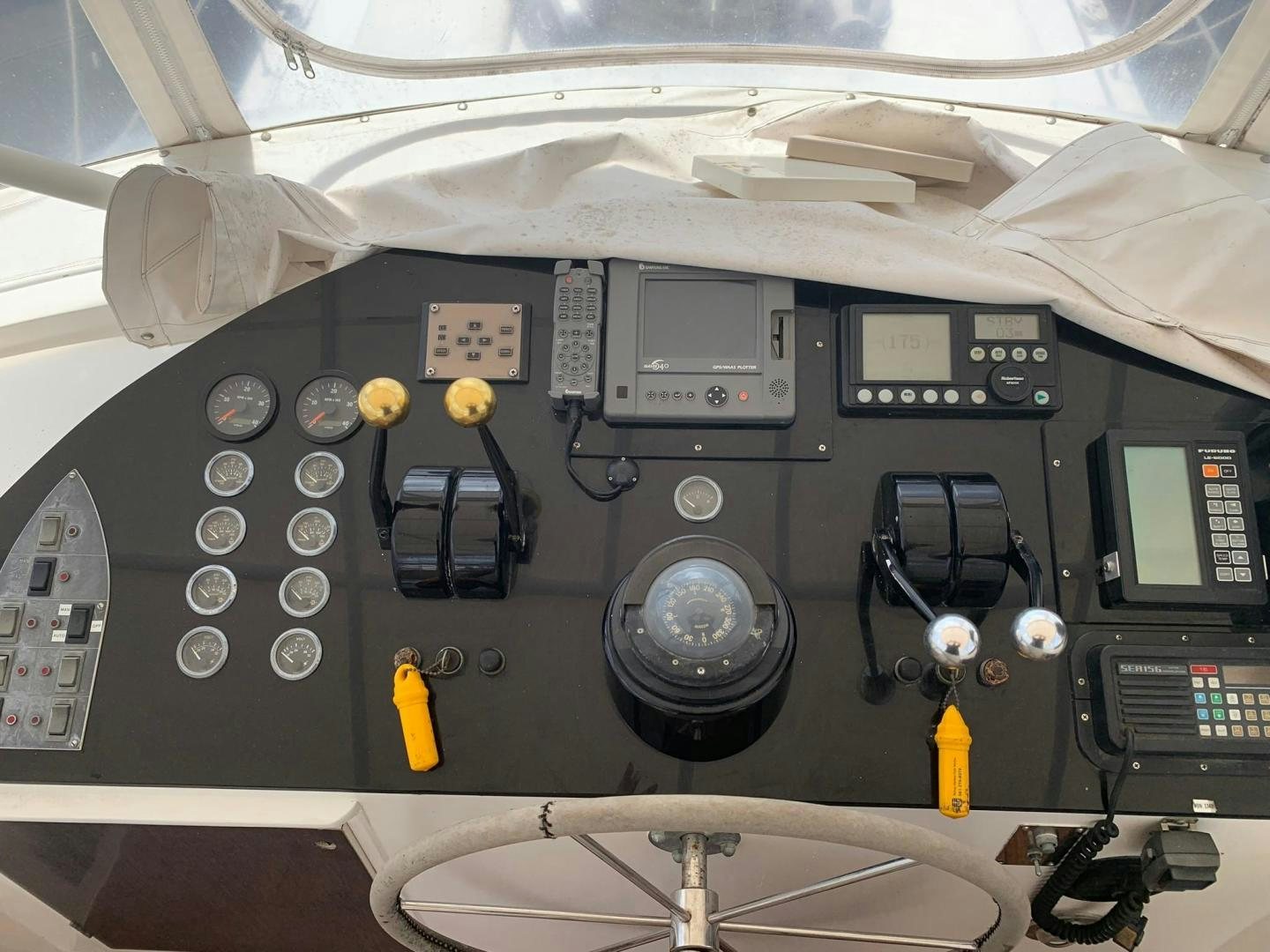 the inside of a car aboard No Name Yacht for Sale