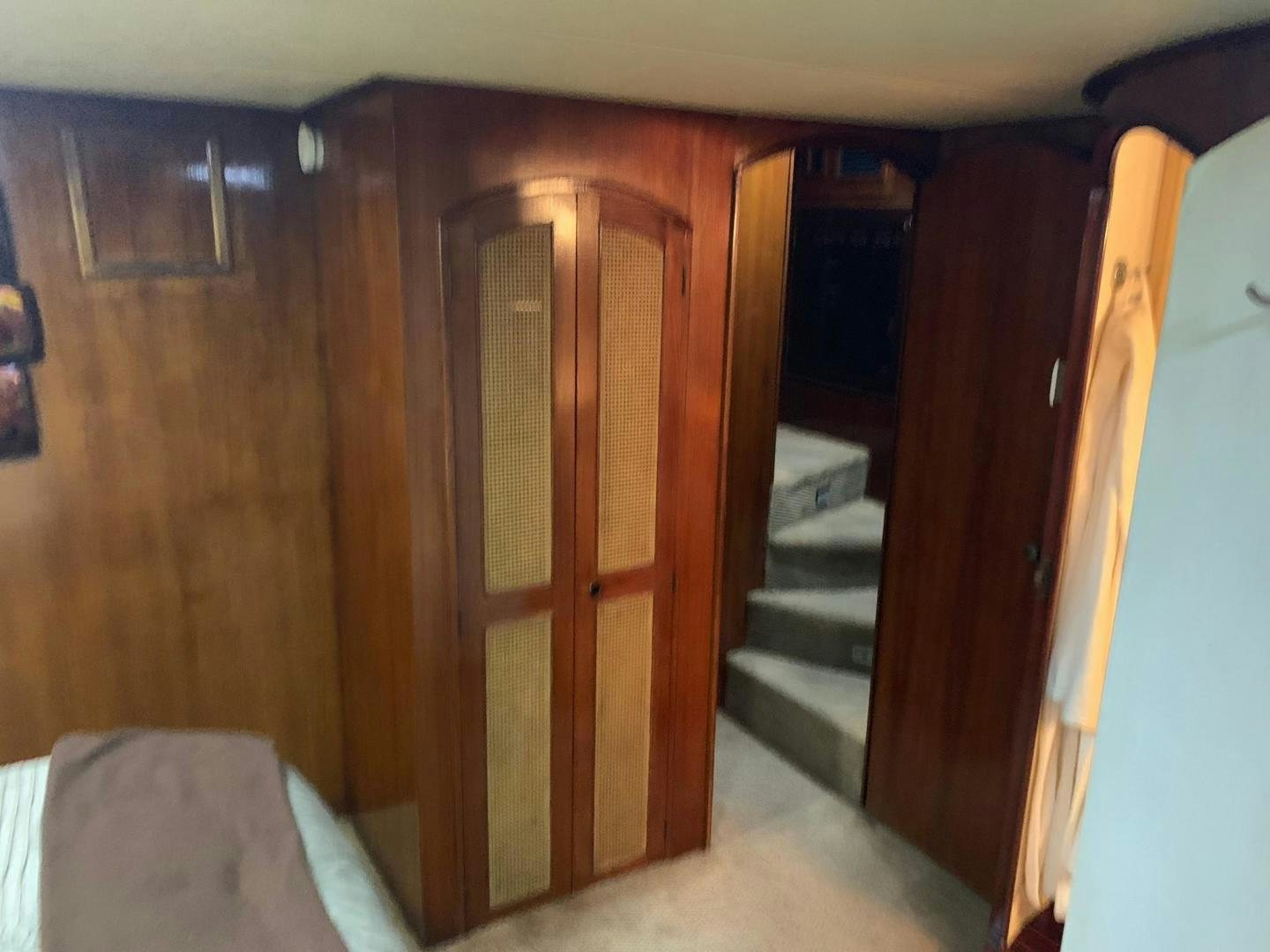 a closet with a bed aboard No Name Yacht for Sale