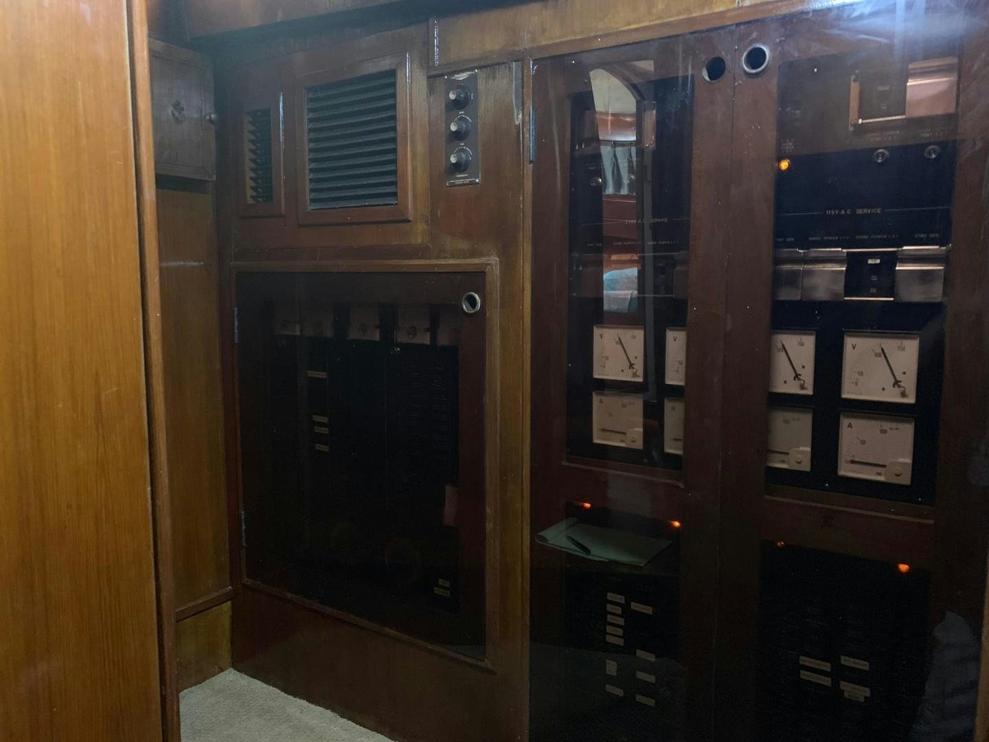 a cabinet with a computer inside aboard No Name Yacht for Sale