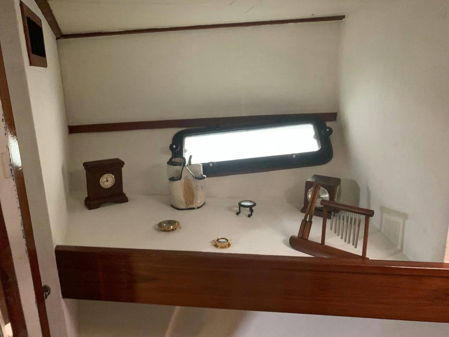 a sink with a light above it aboard No Name Yacht for Sale