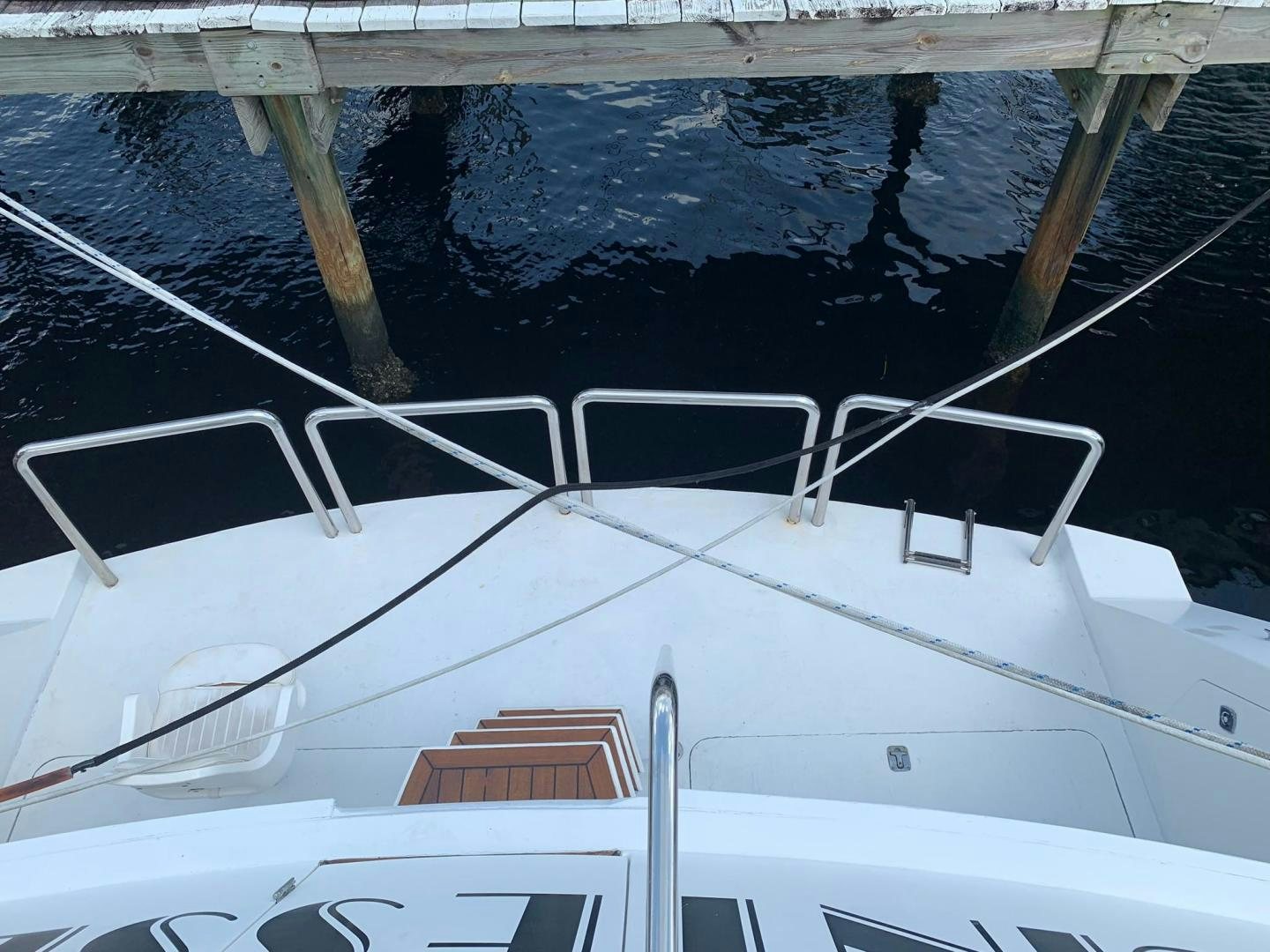 a boat with a ladder aboard No Name Yacht for Sale
