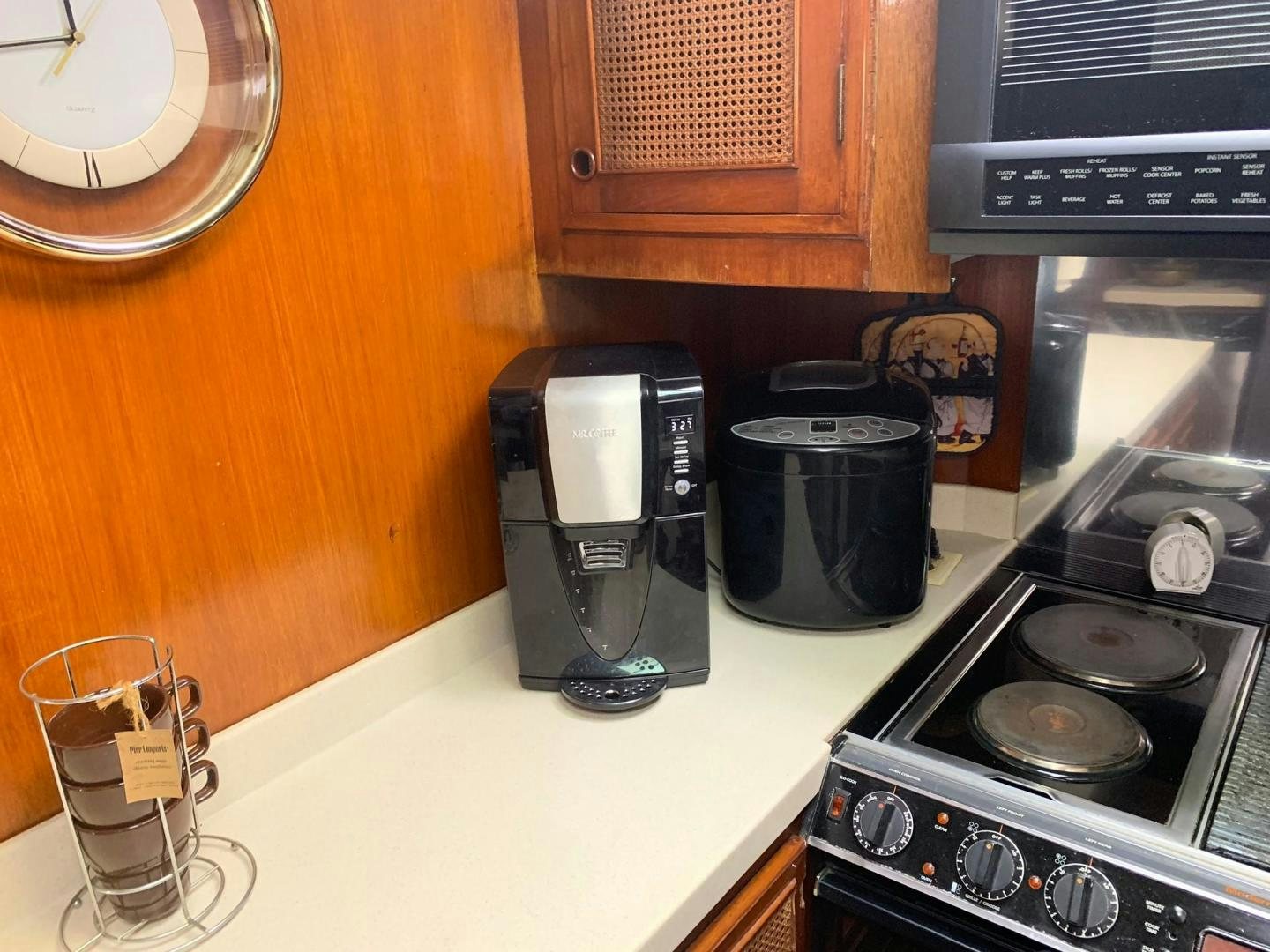 a coffee maker on a counter aboard No Name Yacht for Sale
