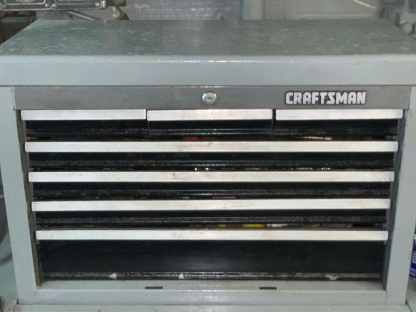 a metal box with a sign on it aboard No Name Yacht for Sale