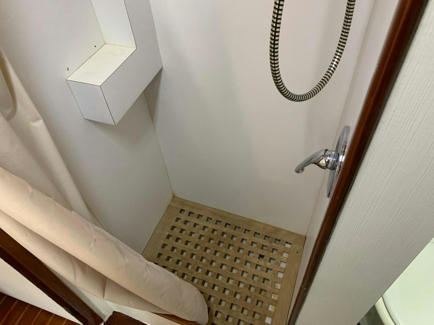 a bathroom with a sink and a toilet aboard No Name Yacht for Sale