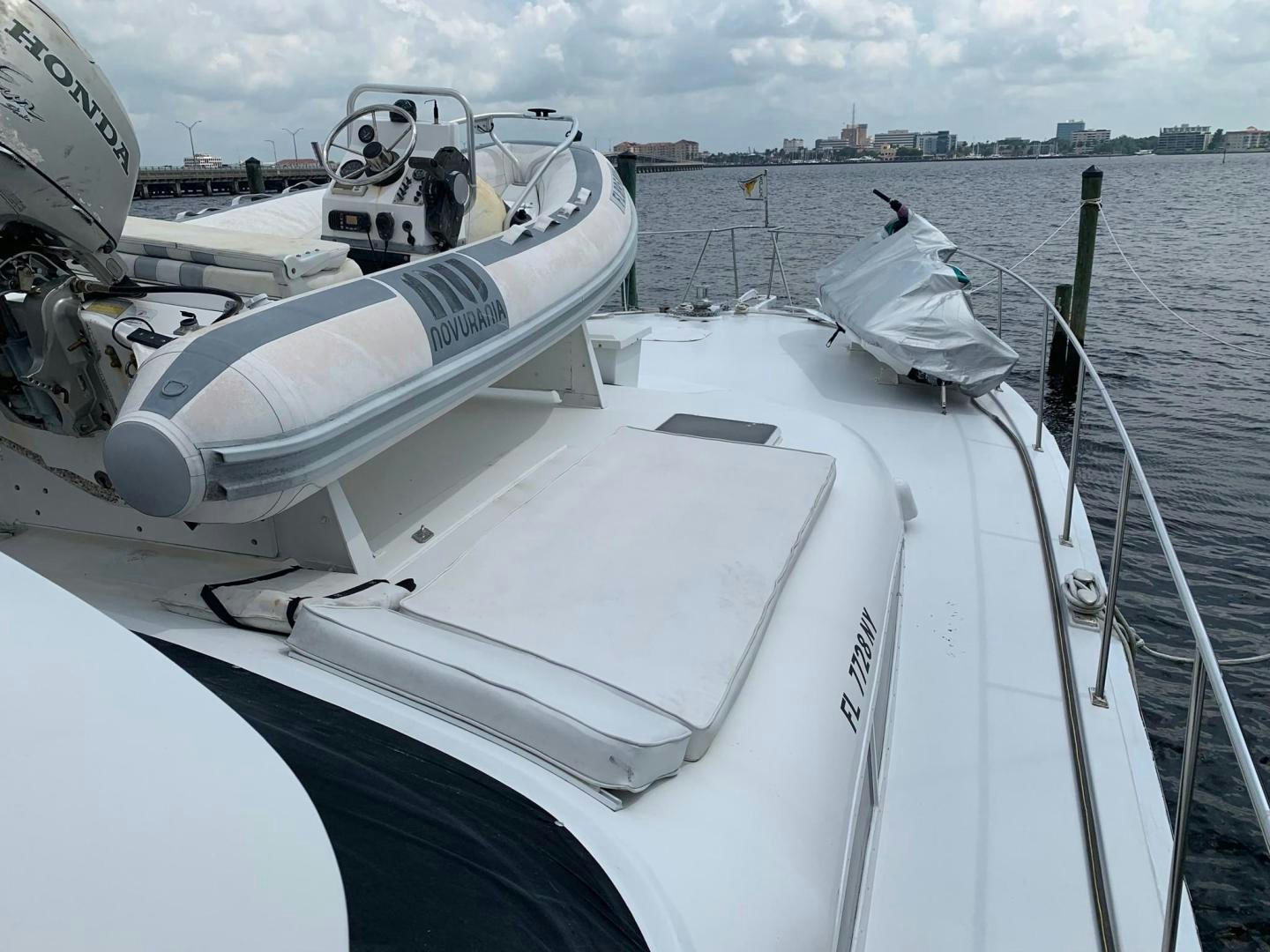 a boat with a person in it aboard No Name Yacht for Sale