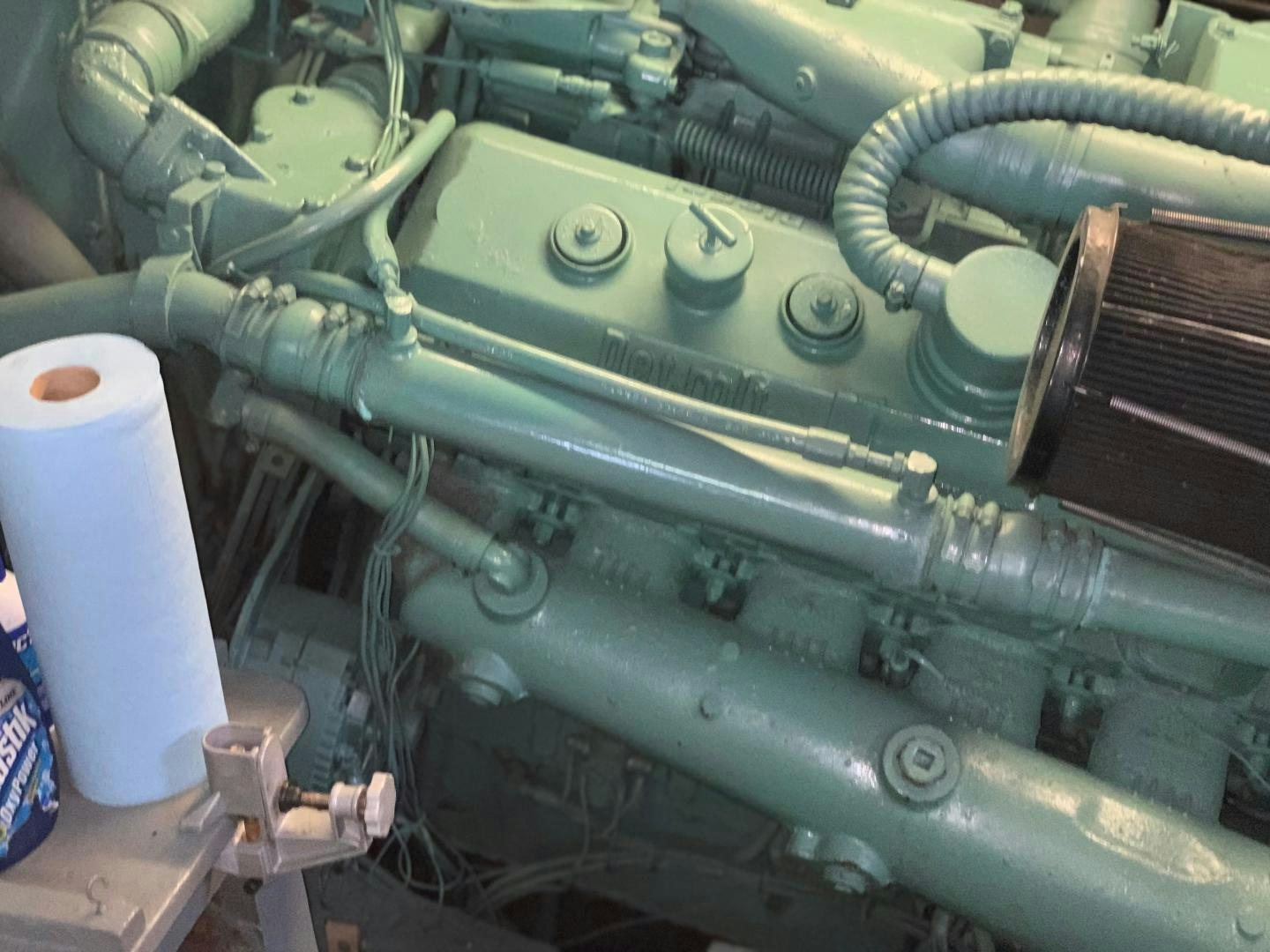 a close-up of a car engine aboard No Name Yacht for Sale