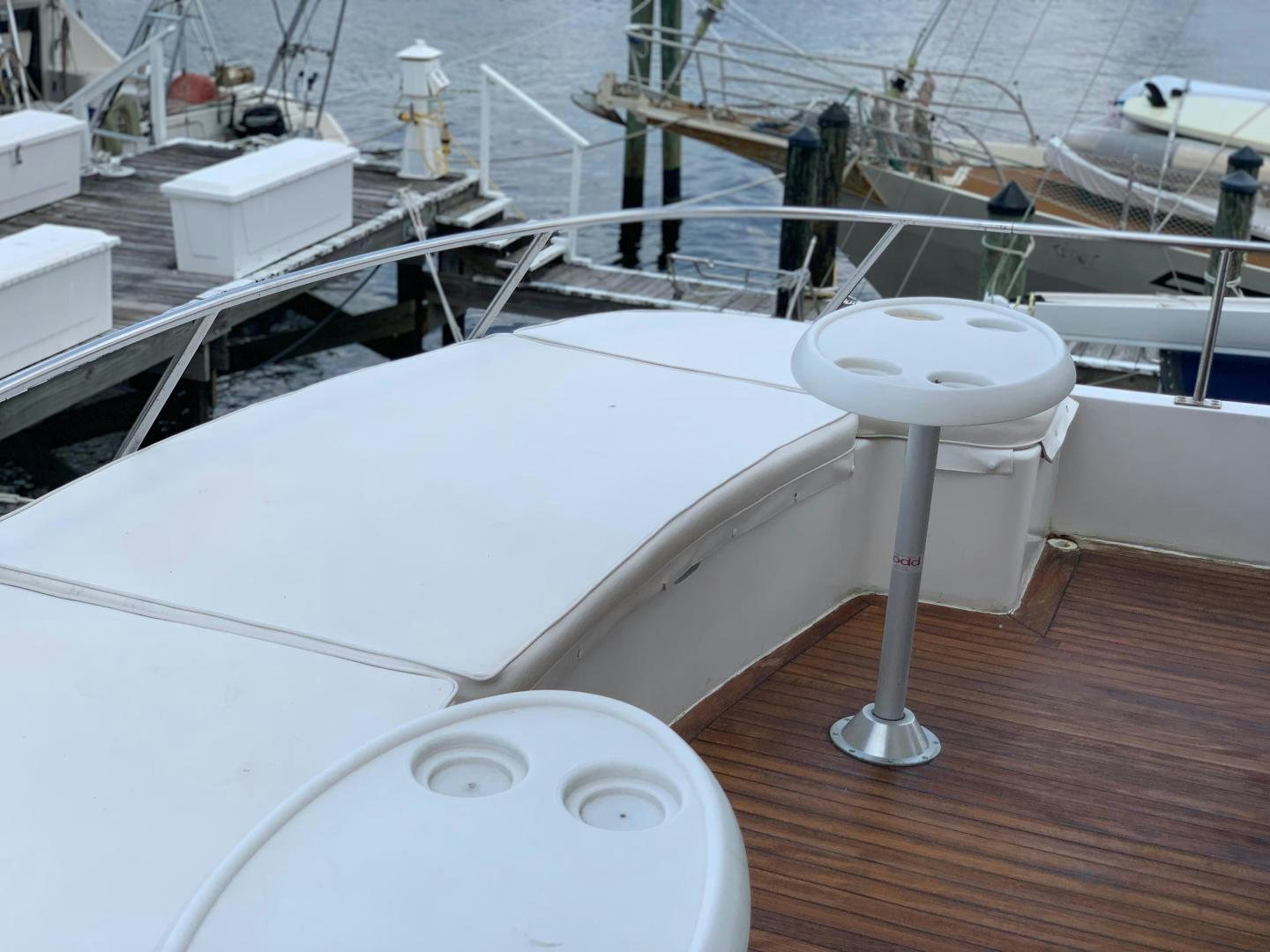 a white boat with a white surface aboard No Name Yacht for Sale