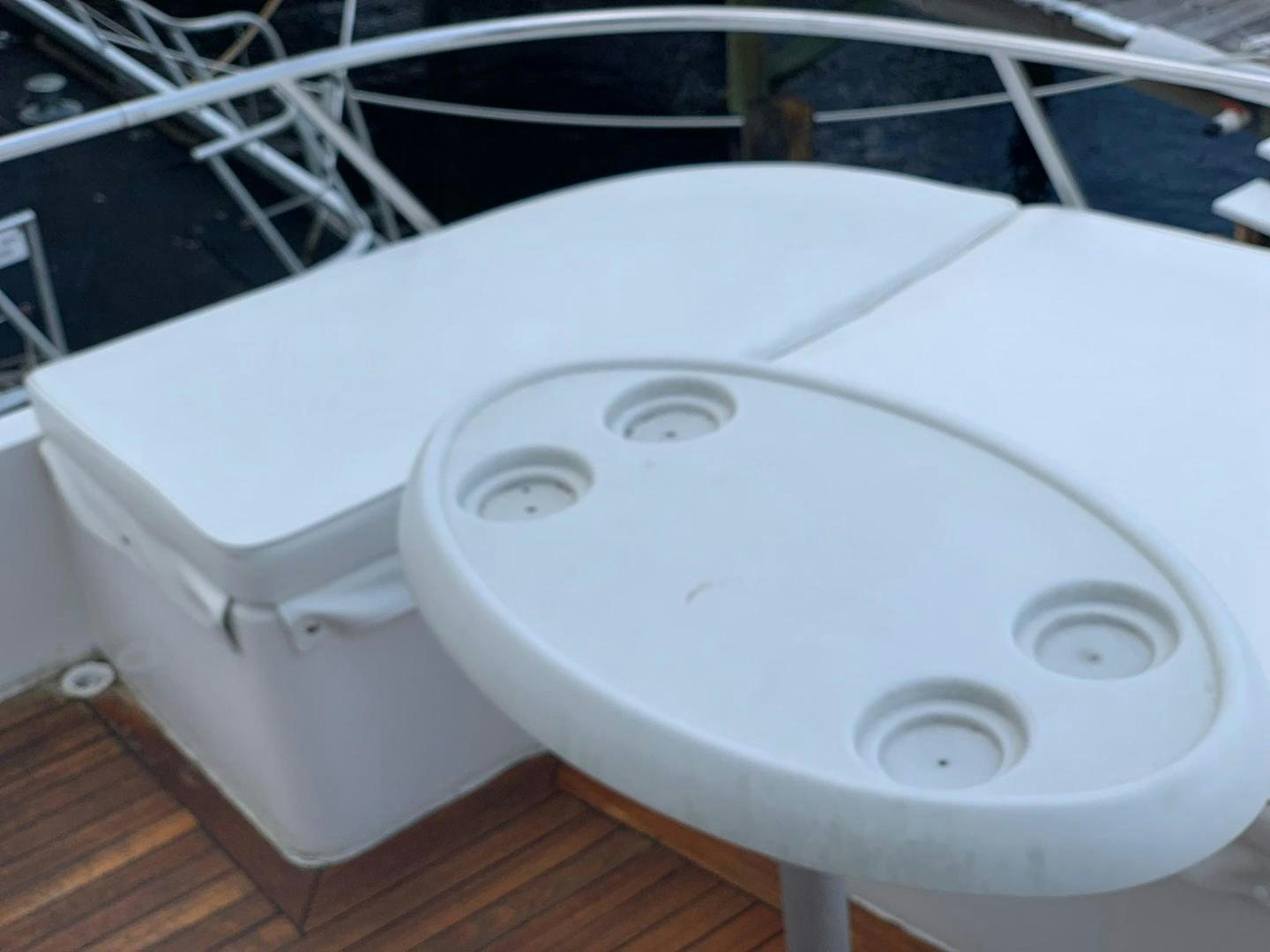 a white toilet with a seat open aboard No Name Yacht for Sale