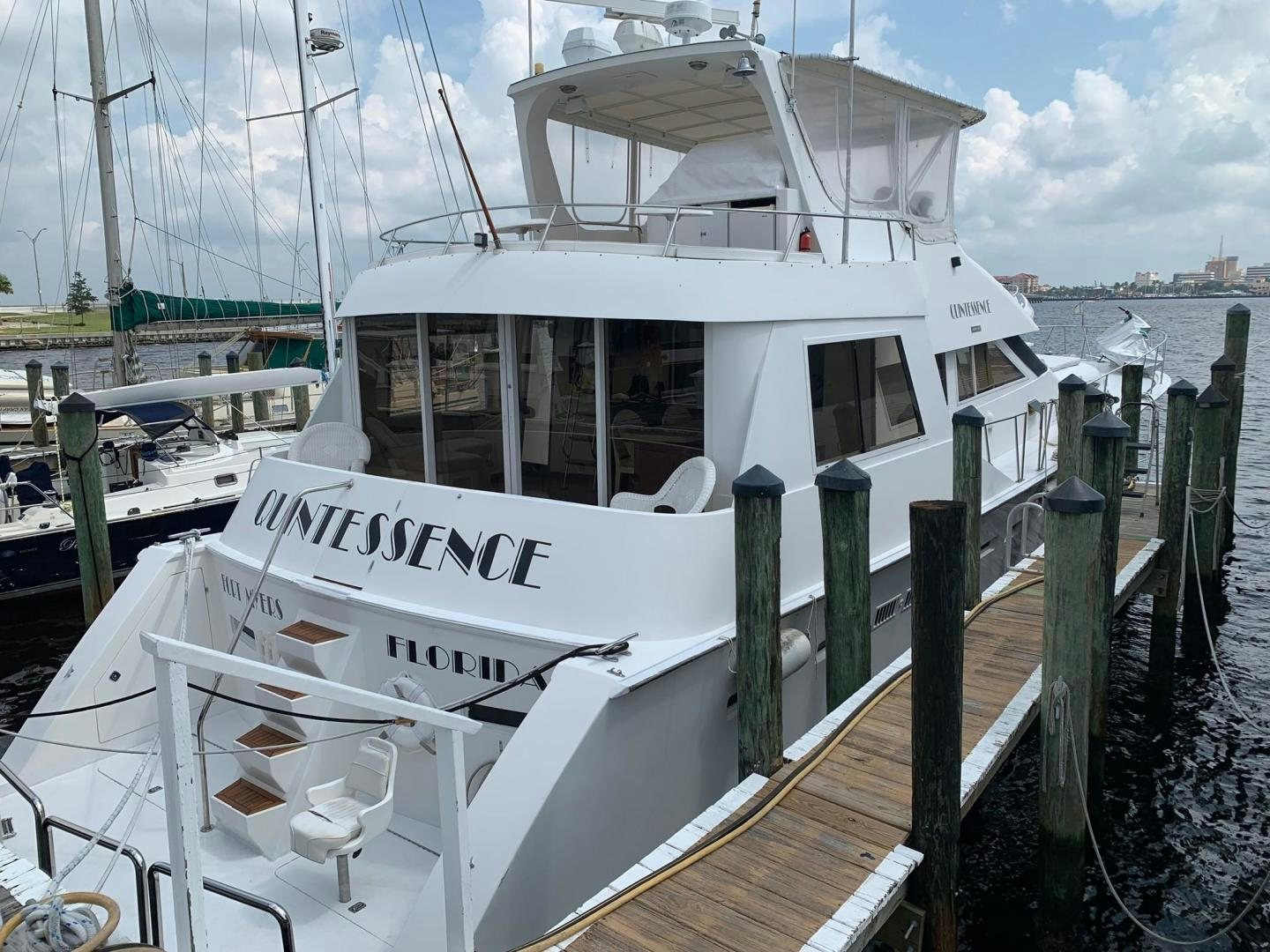 a white boat docked aboard No Name Yacht for Sale