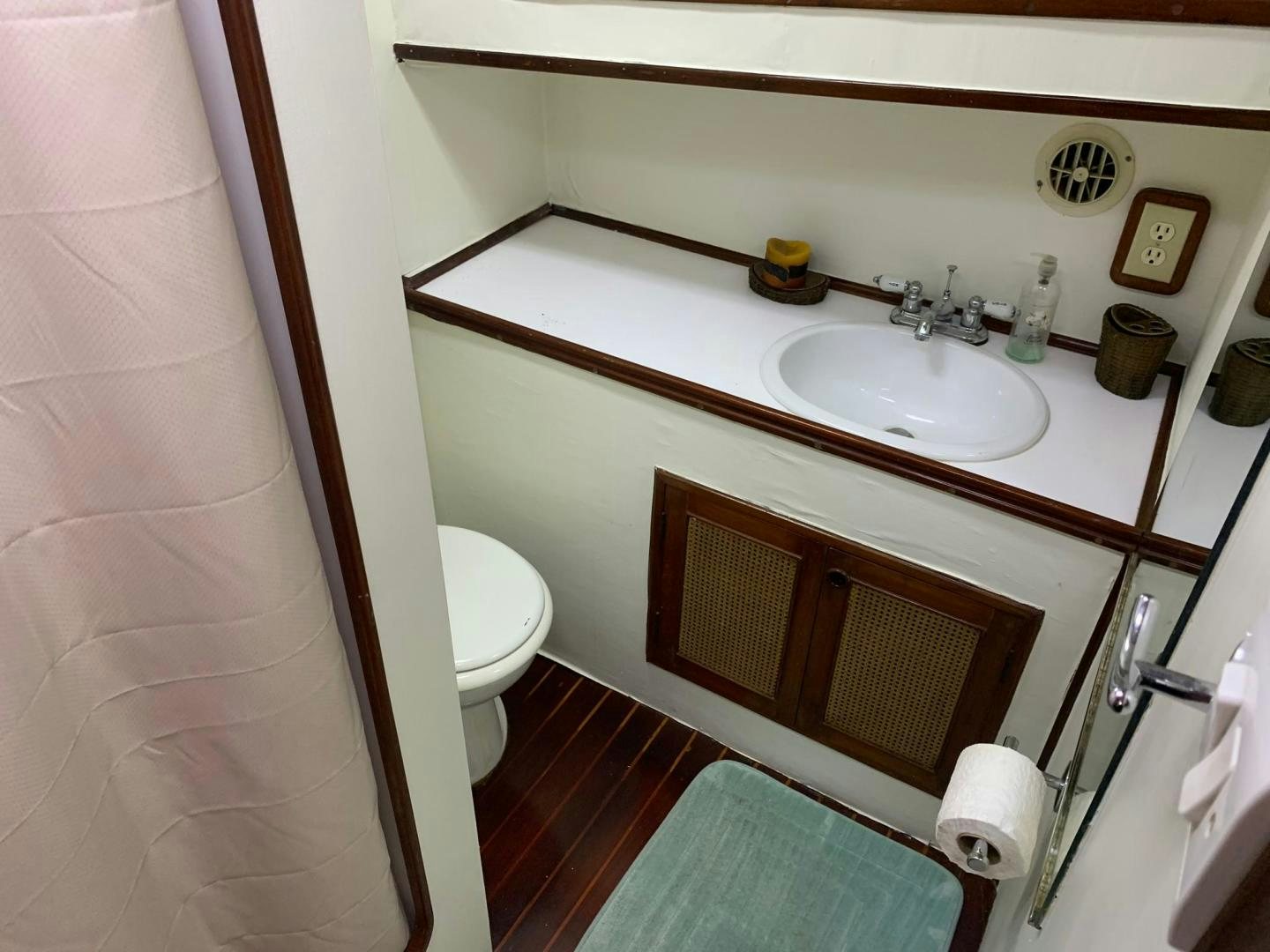 a bathroom with a sink and toilet aboard No Name Yacht for Sale
