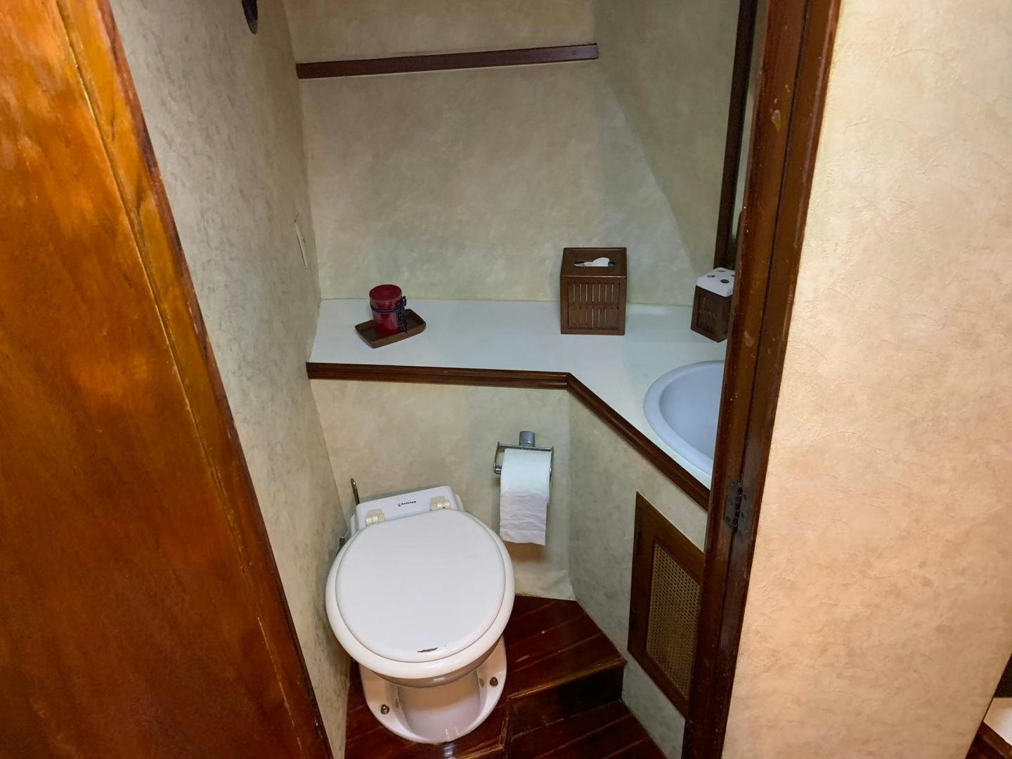a bathroom with a toilet and sink aboard No Name Yacht for Sale