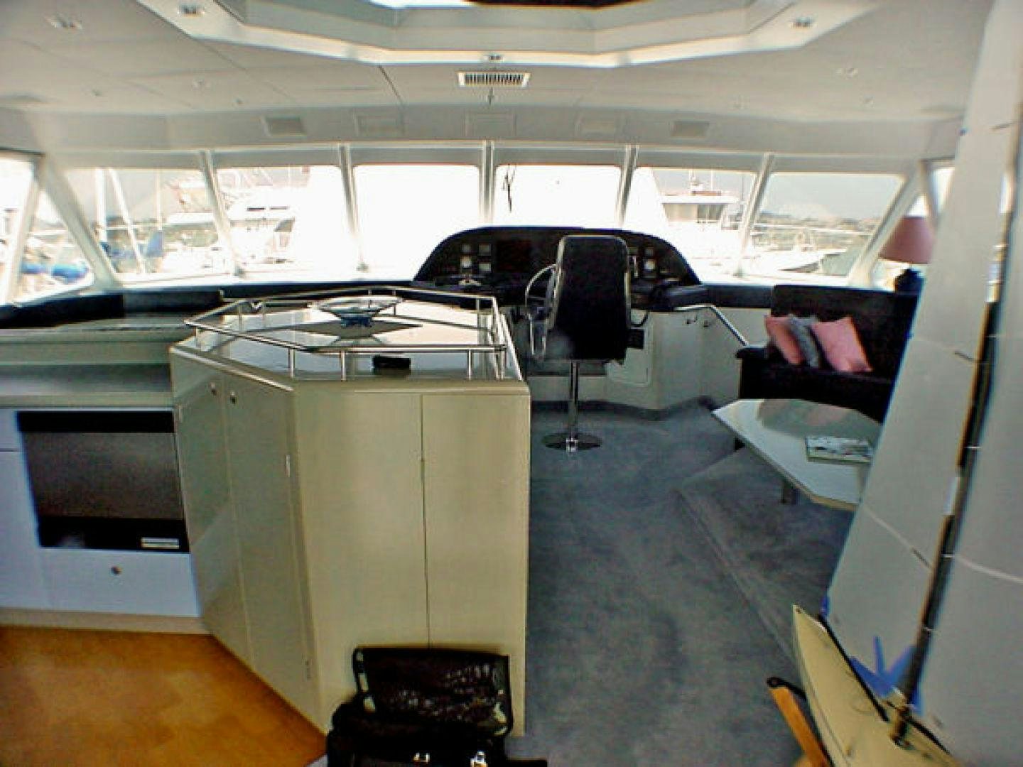a room with a car and a desk aboard O'NEILL Yacht for Sale