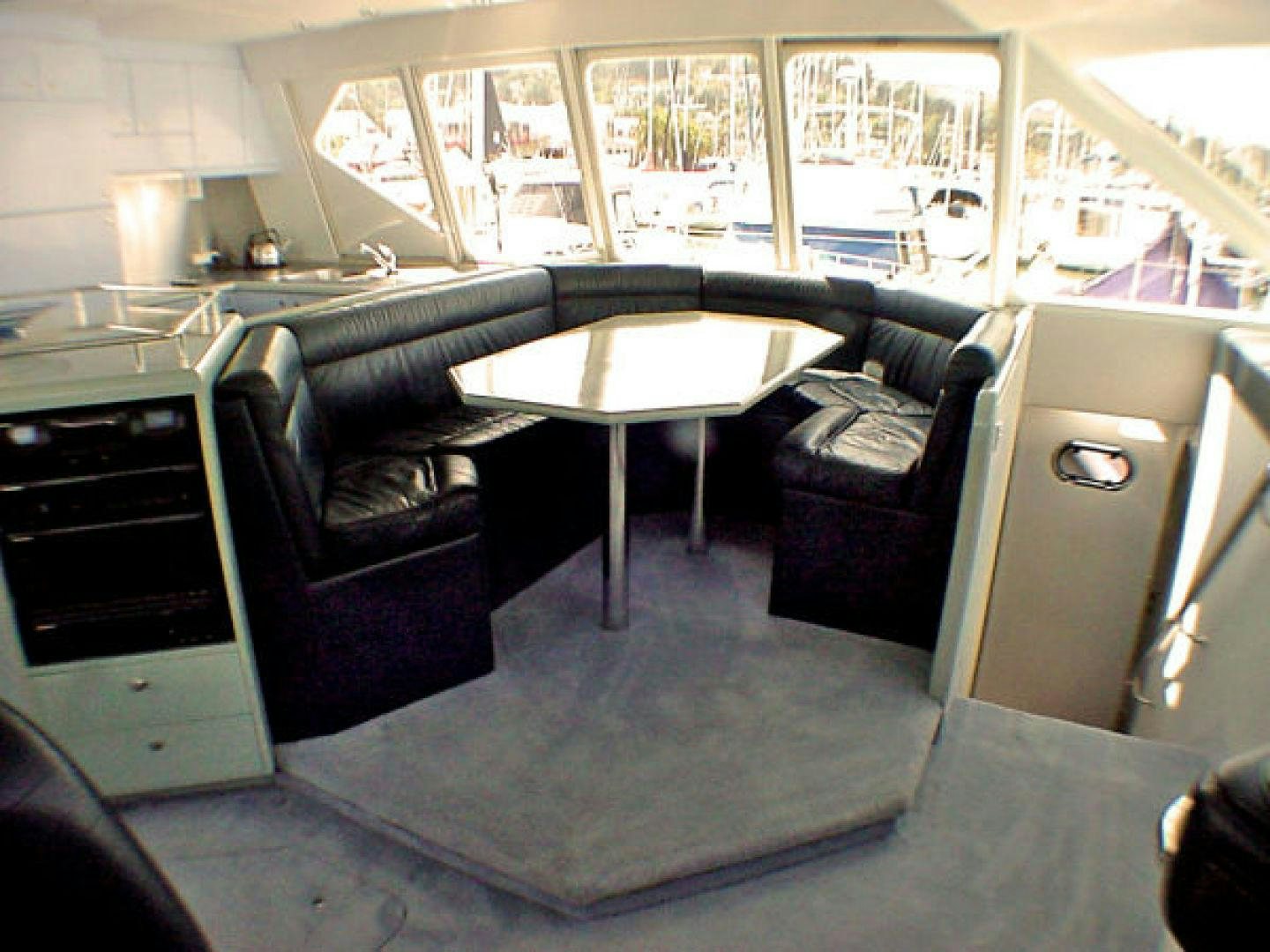 a room with a couch and a table aboard O'NEILL Yacht for Sale