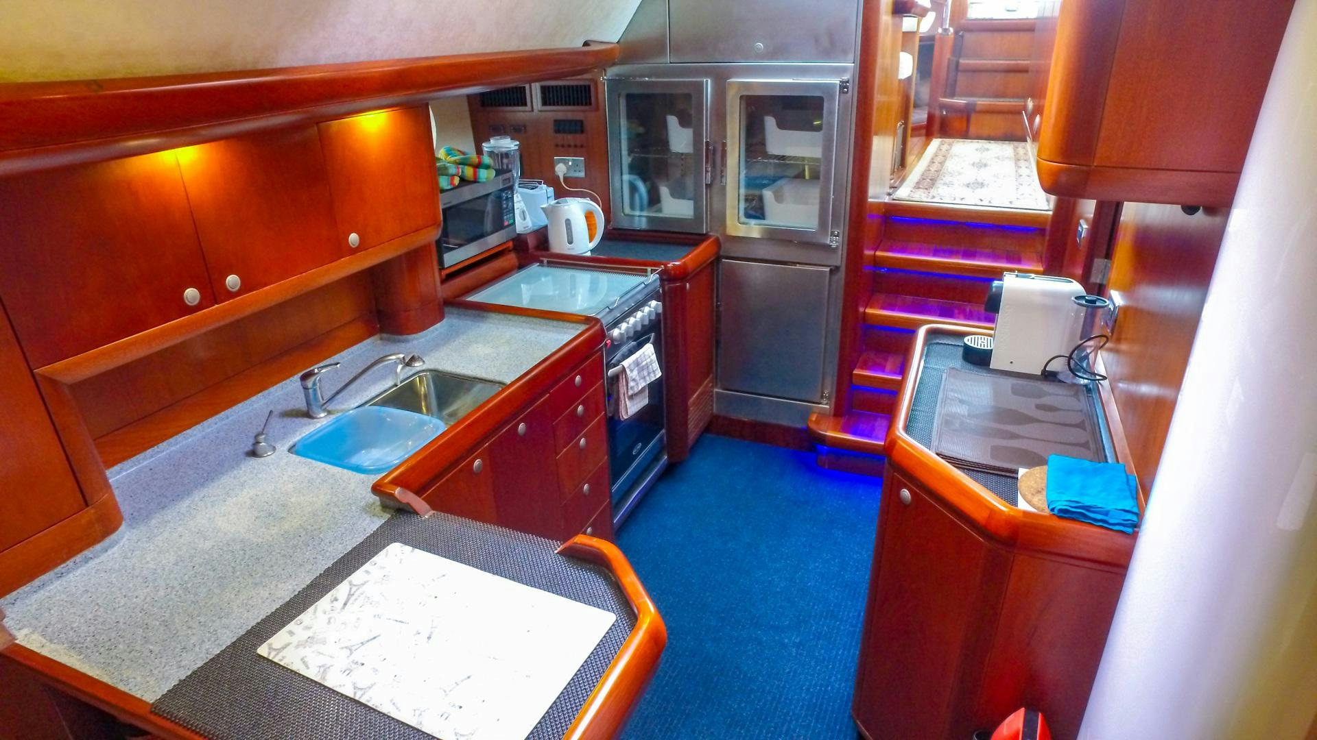a kitchen with a sink and a stove aboard GOLDEN OPUS Yacht for Sale