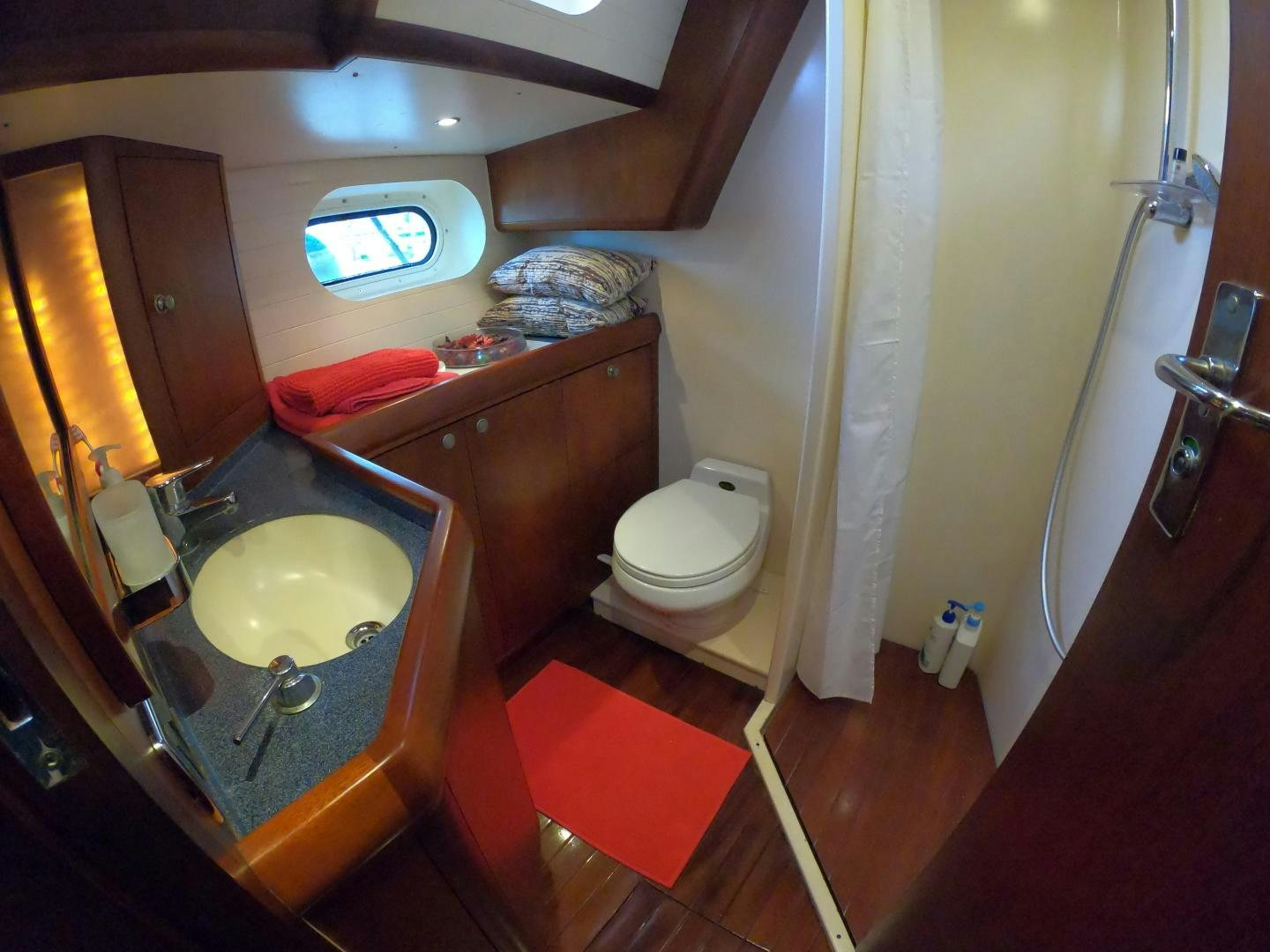 a bathroom with a sink and toilet aboard GOLDEN OPUS Yacht for Sale