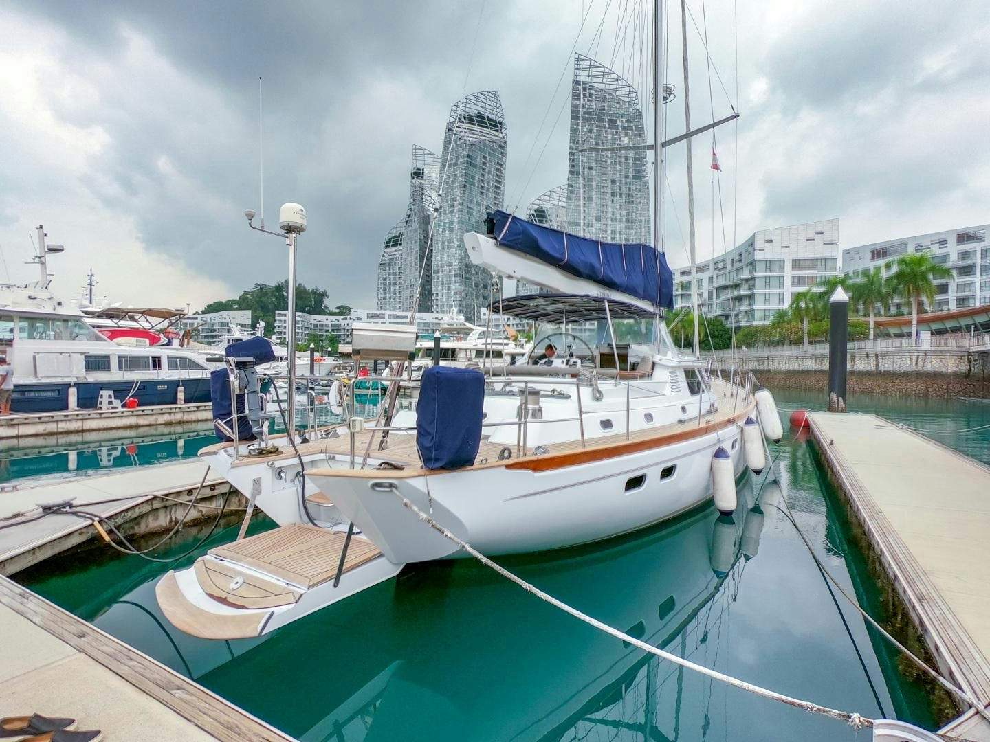 boats docked at a pier aboard GOLDEN OPUS Yacht for Sale