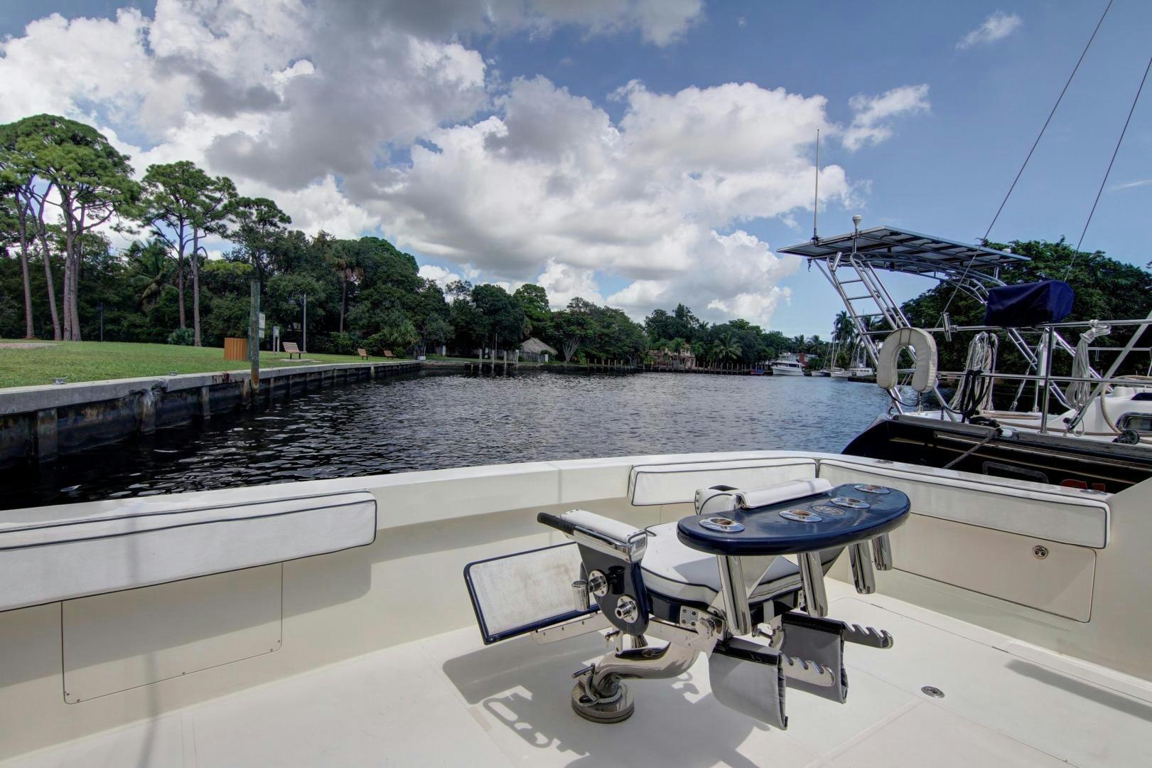 a boat docked at a pier aboard UNSINKABLE II Yacht for Sale
