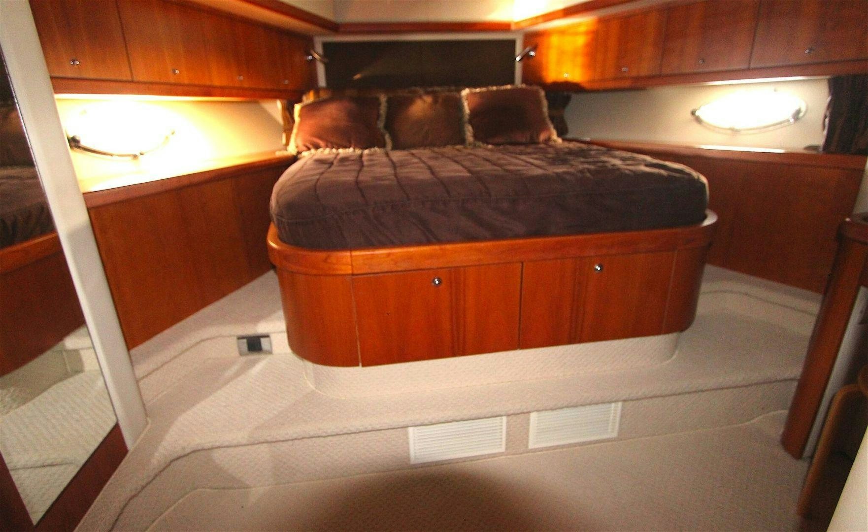 a bed in a room aboard No Name Yacht for Sale