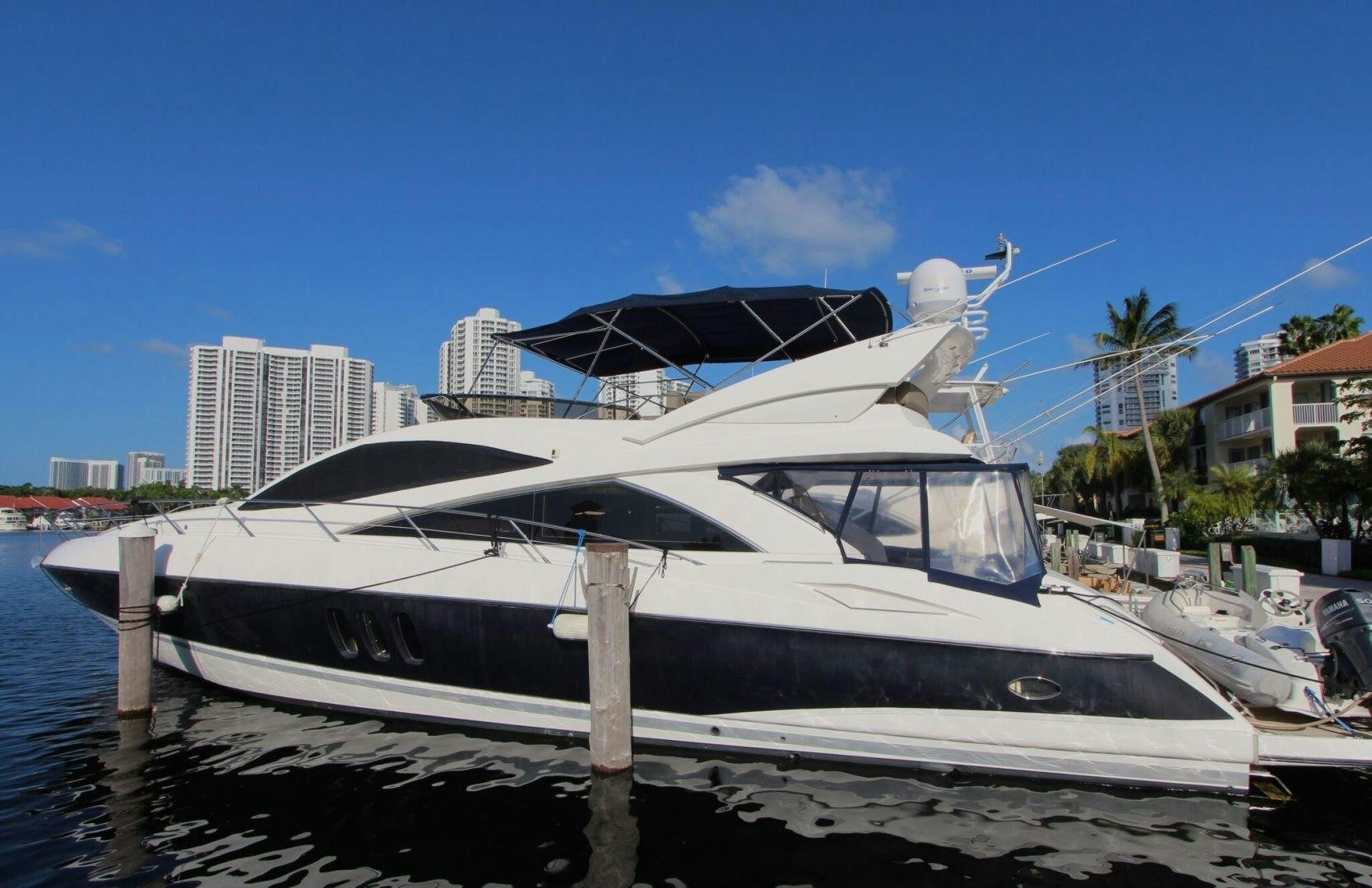 a boat docked at a pier aboard No Name Yacht for Sale