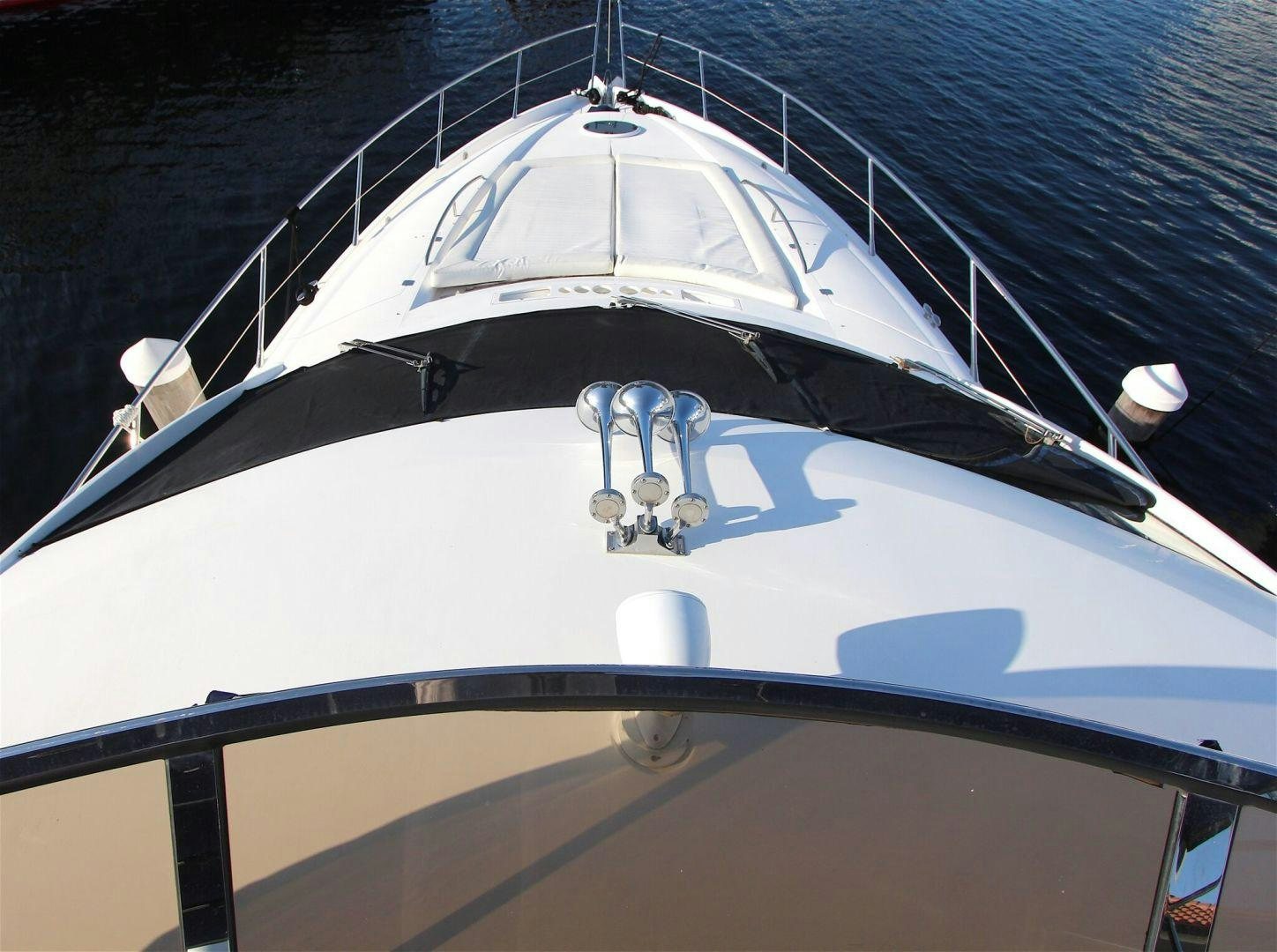 a white ceiling with a black and silver ceiling aboard No Name Yacht for Sale