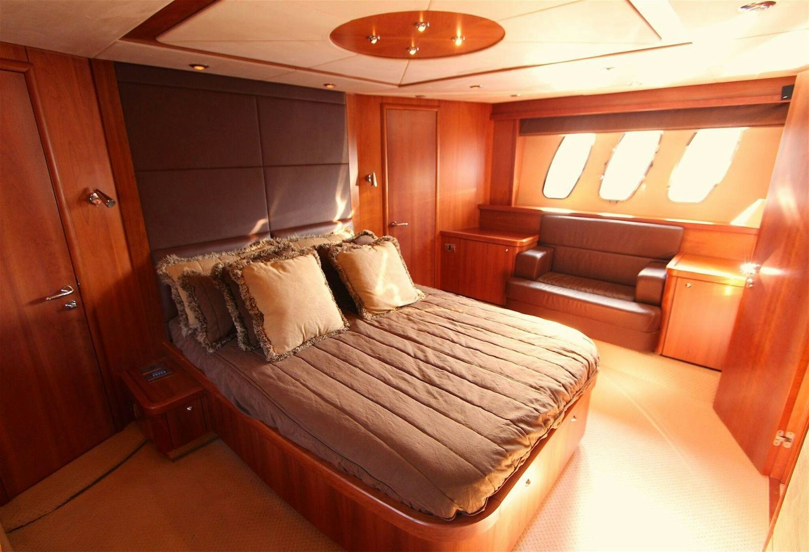 a bed in a room aboard No Name Yacht for Sale