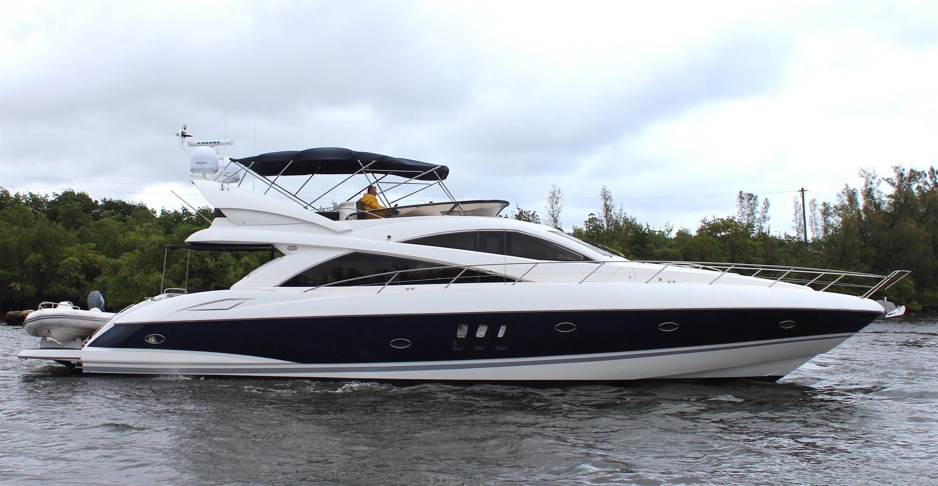 a yacht on the water aboard No Name Yacht for Sale