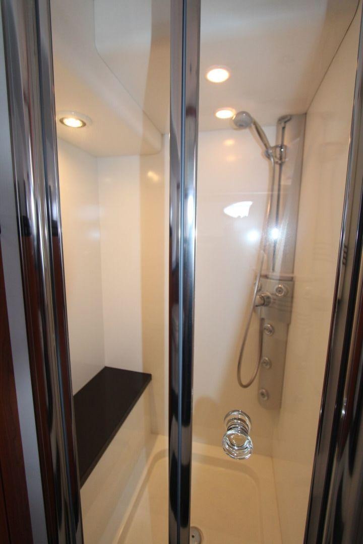 a shower with a glass door aboard No Name Yacht for Sale