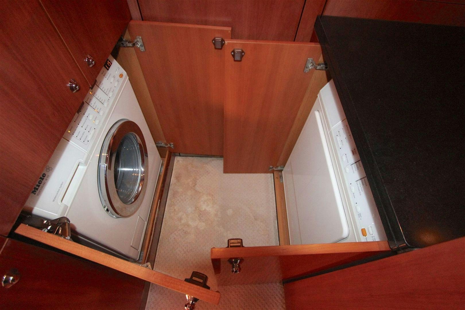 a white washing machine aboard No Name Yacht for Sale