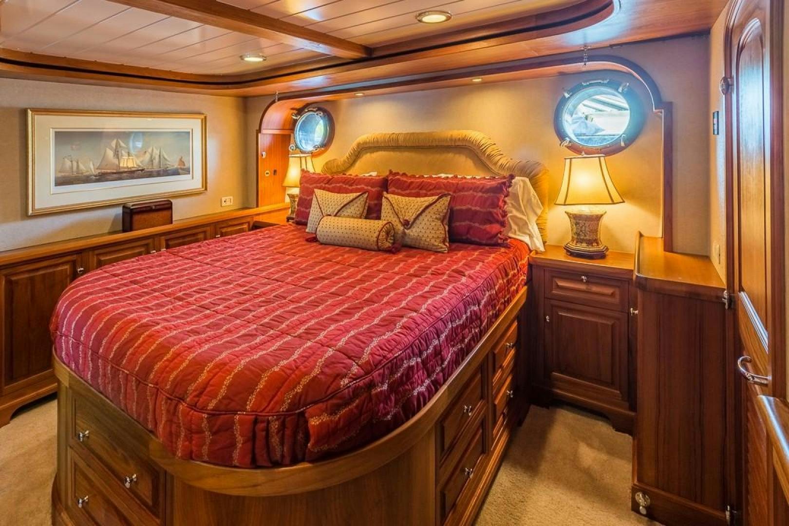 a bed in a room aboard HERCULES Yacht for Sale