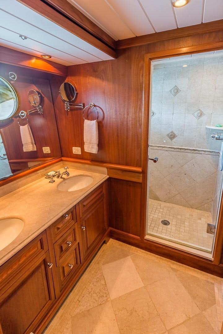 a bathroom with a sink and a shower aboard HERCULES Yacht for Sale