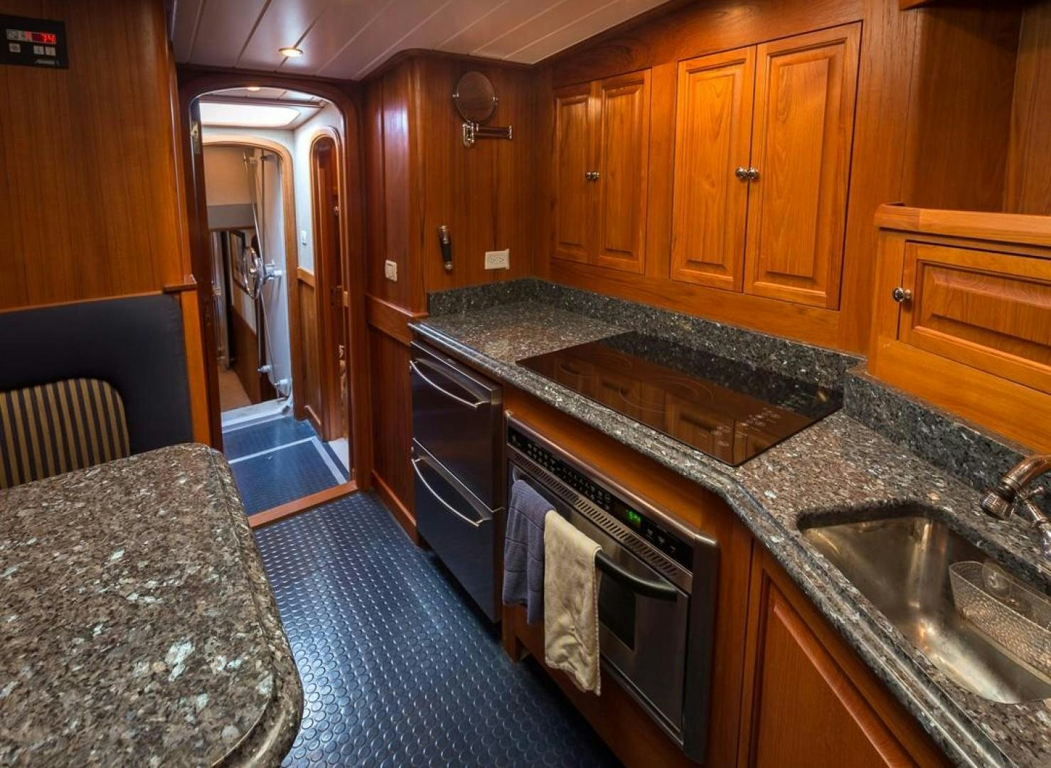 a kitchen with granite counter tops aboard HERCULES Yacht for Sale