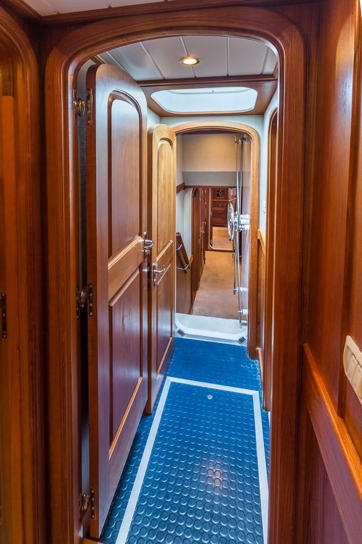 a hallway with doors aboard HERCULES Yacht for Sale