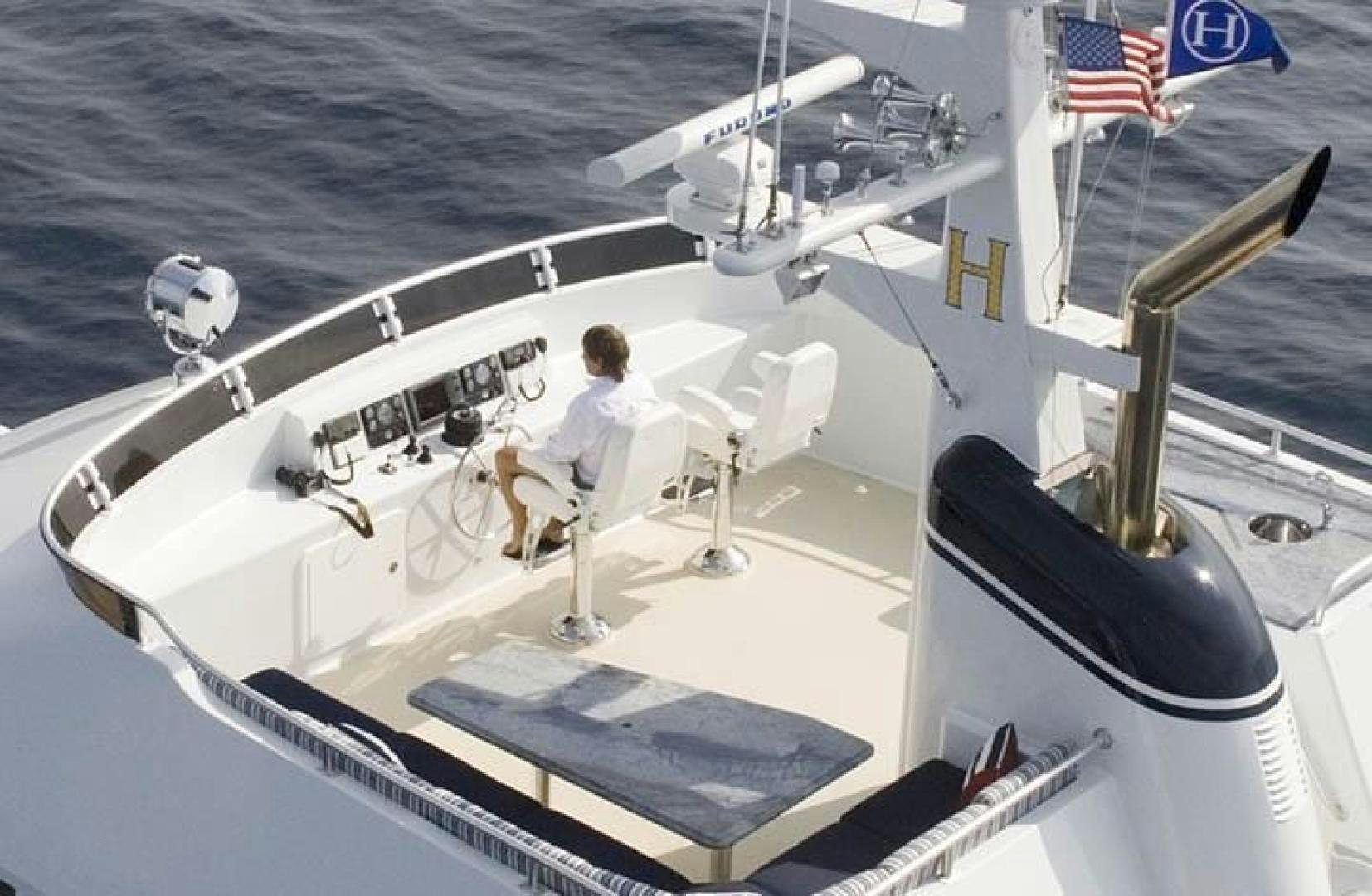 a person and a dog on a boat aboard HERCULES Yacht for Sale