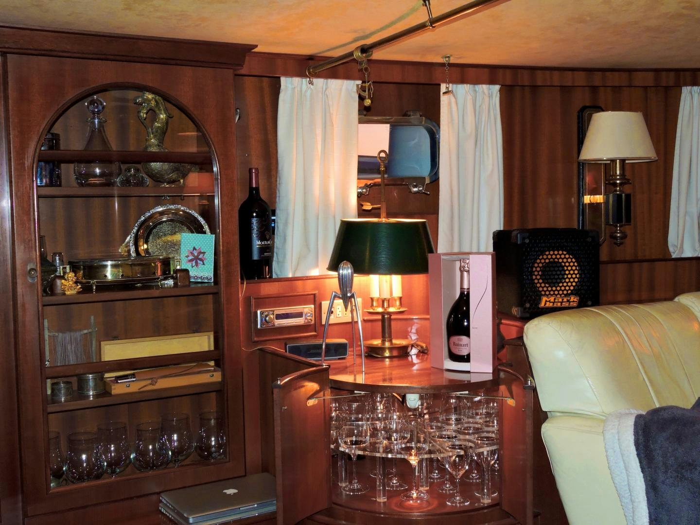 a room with a table and a mirror aboard WHITE GARUDA Yacht for Sale