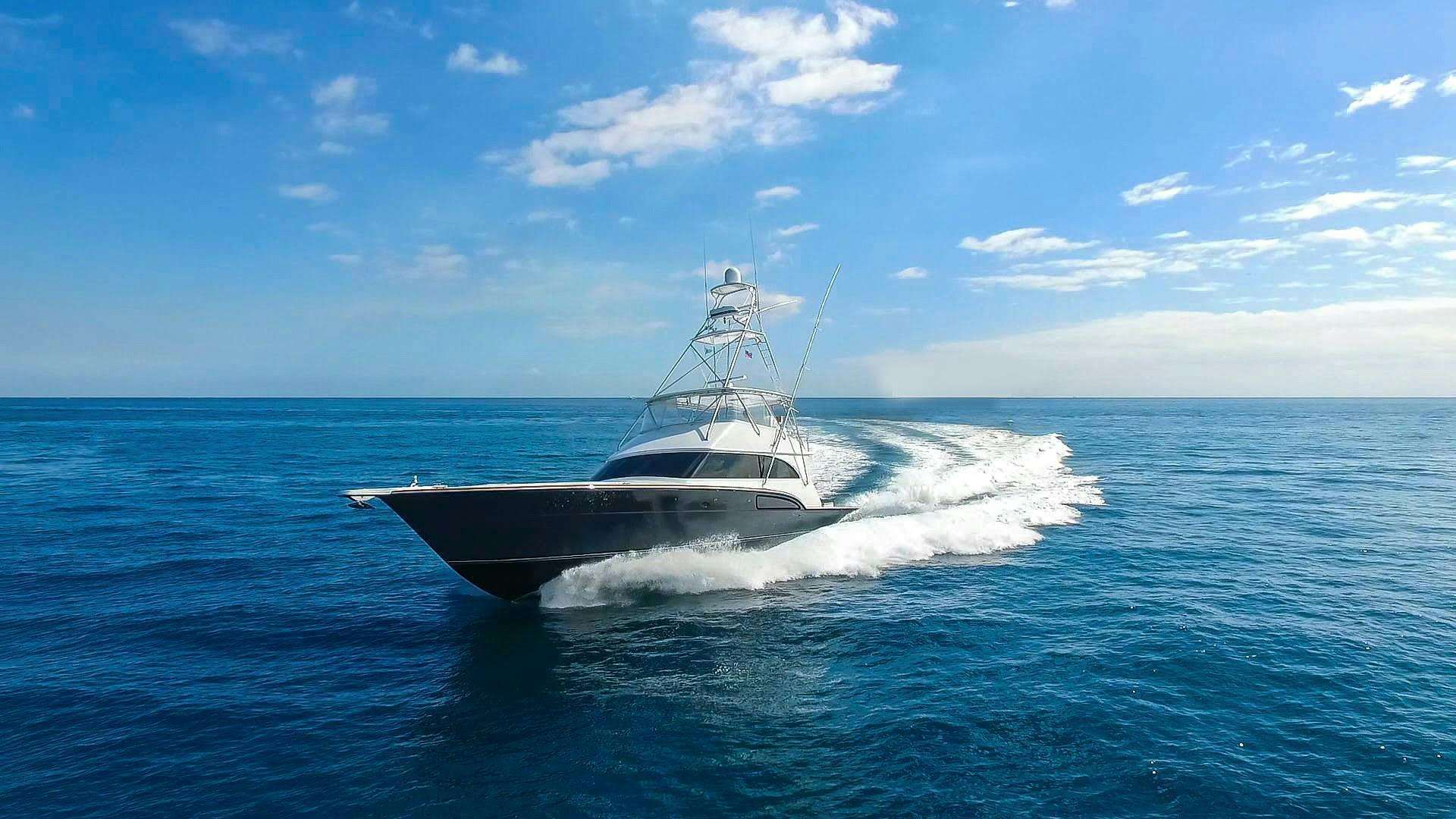 a boat on the water aboard DONZI 73 Yacht for Sale