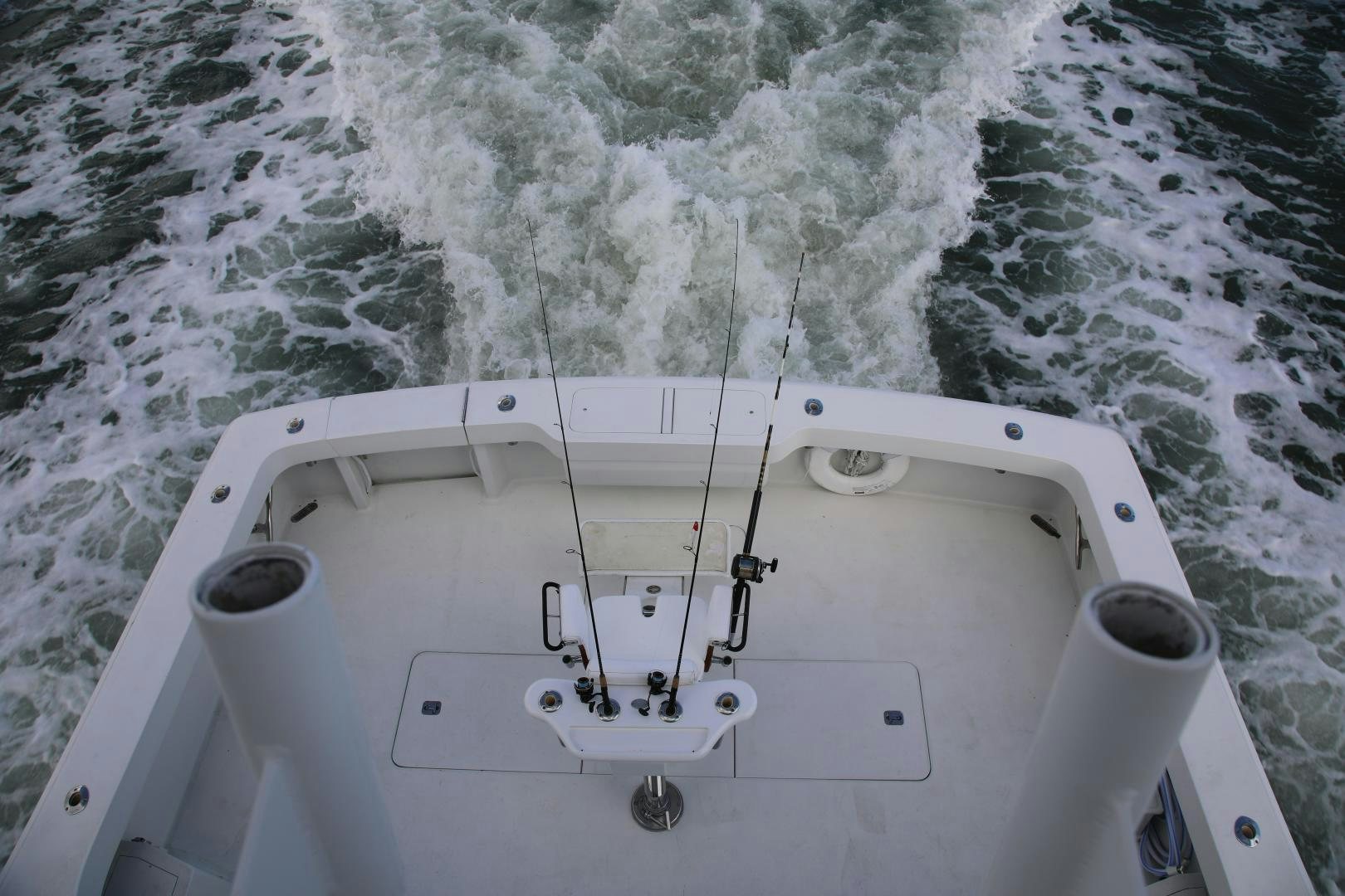 a white boat in the water aboard No Name Yacht for Sale