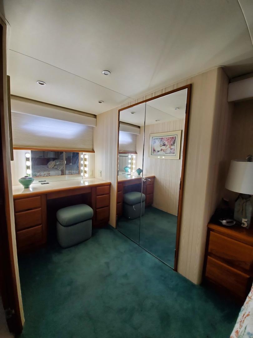 a bathroom with a sink and a mirror aboard No Name Yacht for Sale