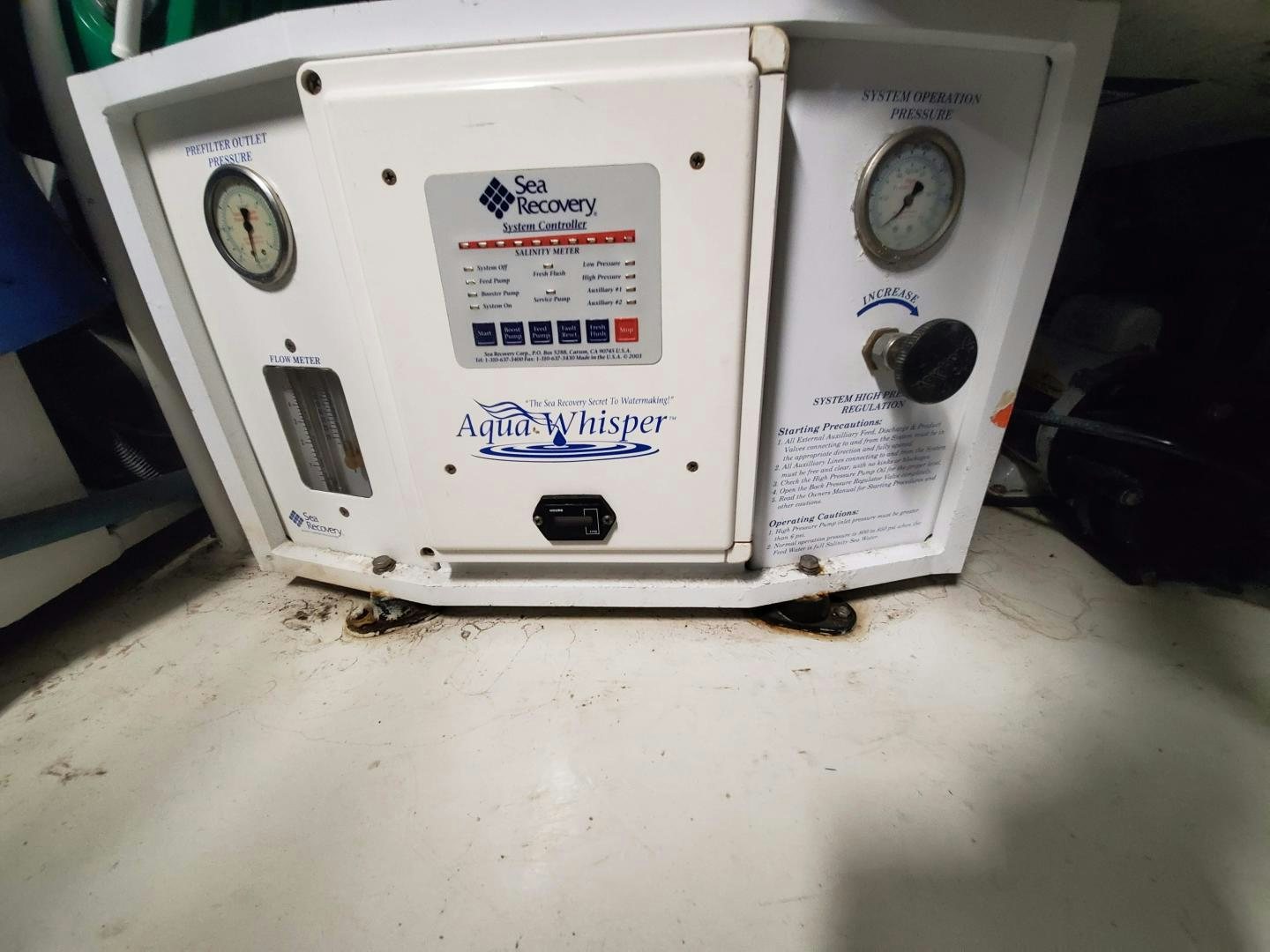 a white washing machine aboard No Name Yacht for Sale