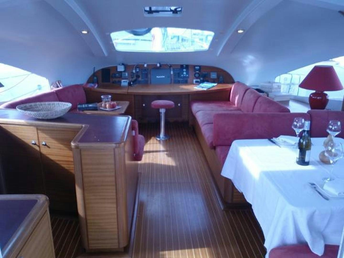 a restaurant with a table and chairs aboard No Name Yacht for Sale