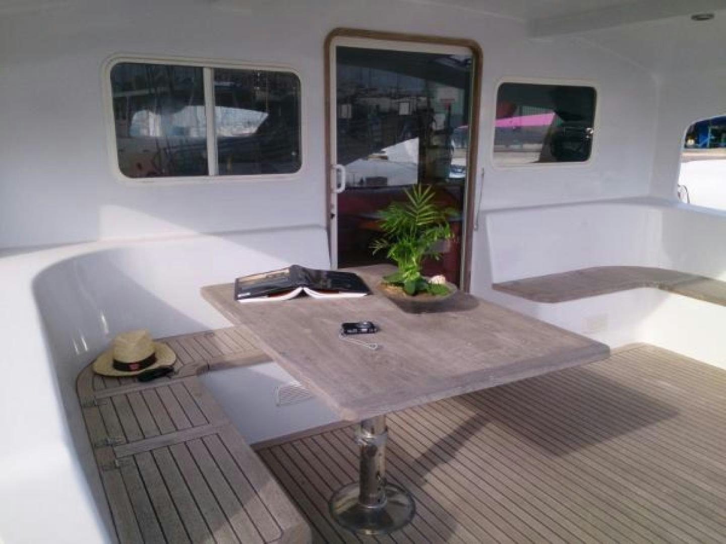 a table with a plant on it aboard No Name Yacht for Sale