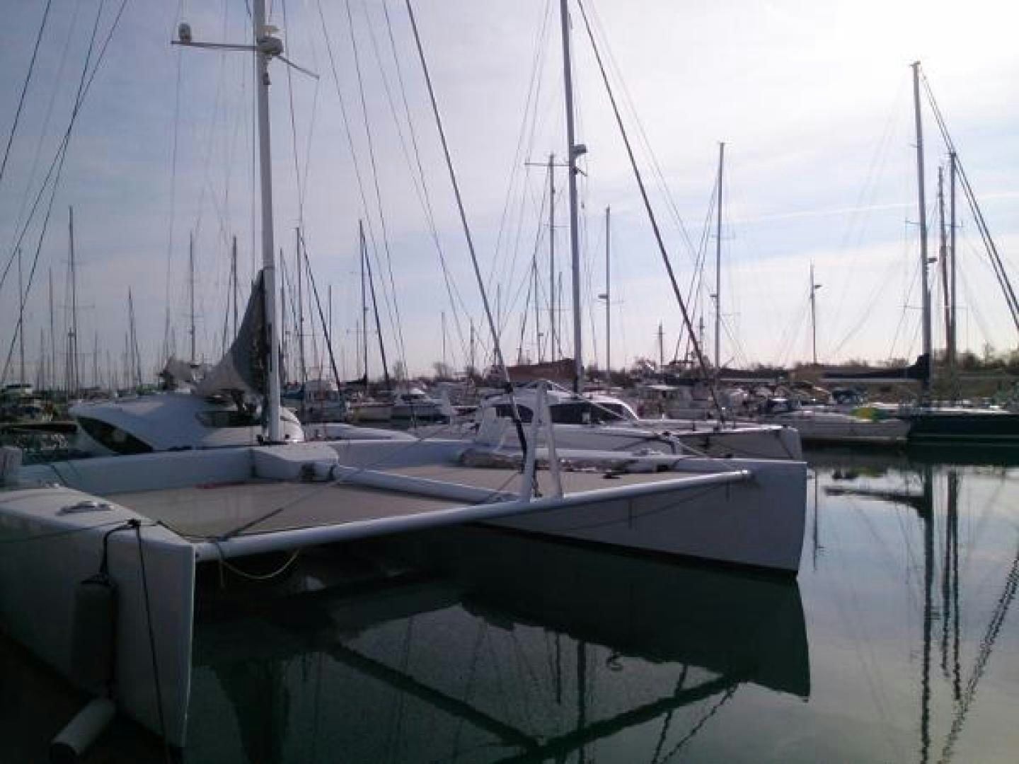 a group of boats are parked in a harbor aboard No Name Yacht for Sale