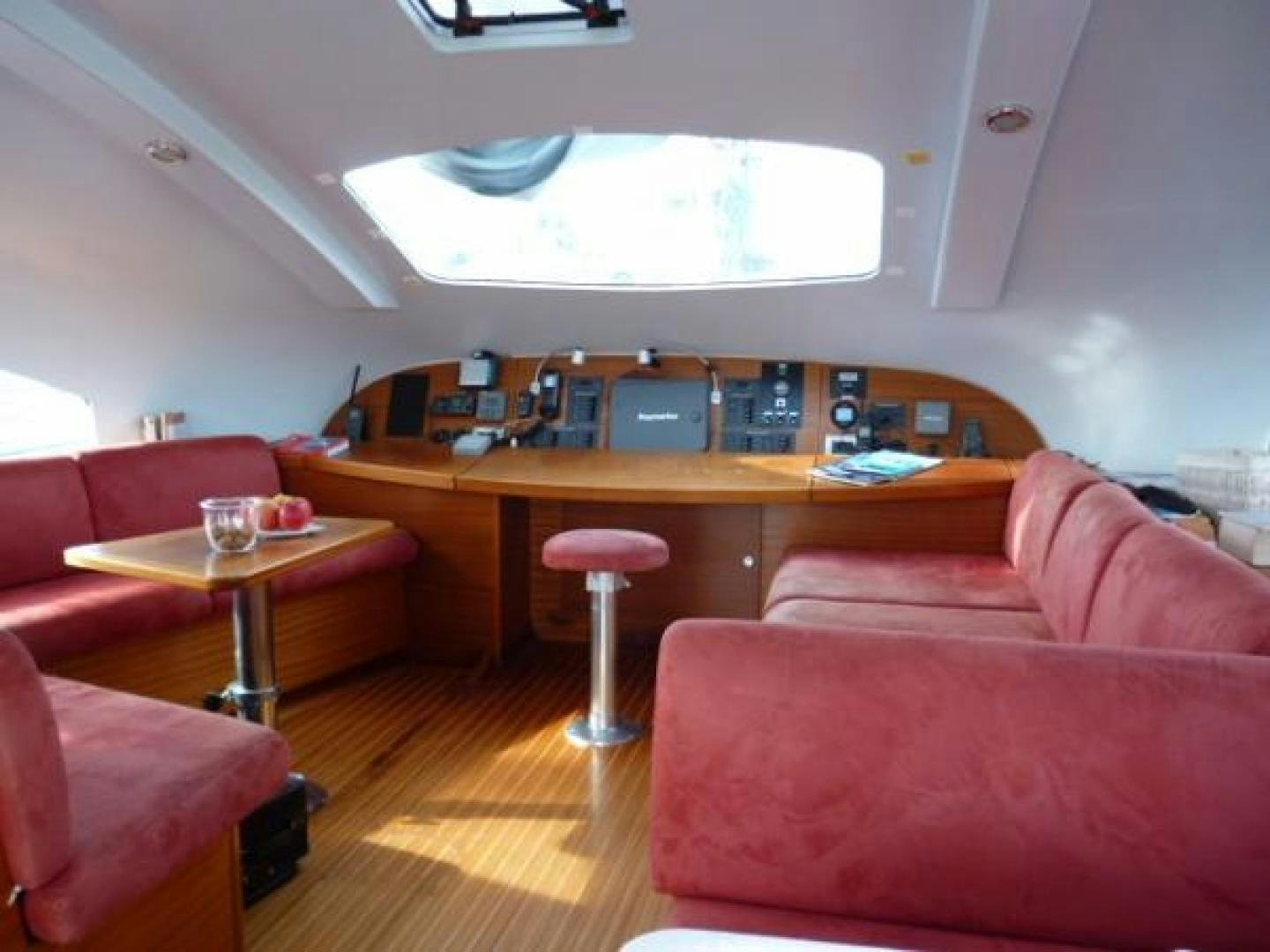 a room with a laptop and a table aboard No Name Yacht for Sale