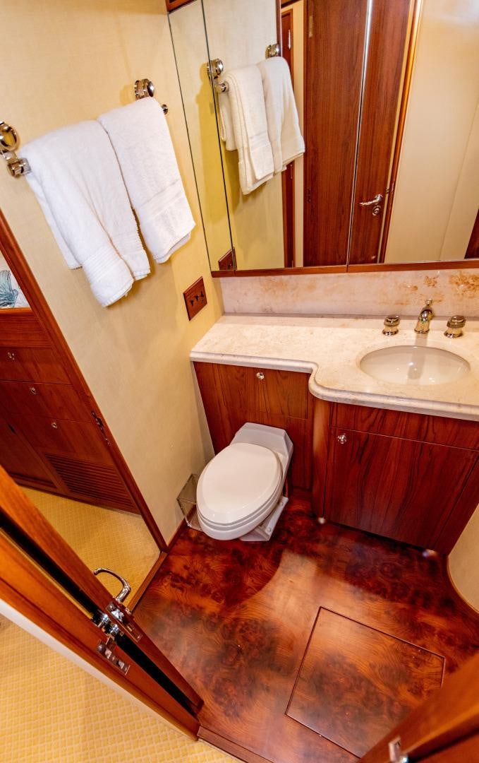 a bathroom with a sink and toilet aboard WATASHEE Yacht for Sale