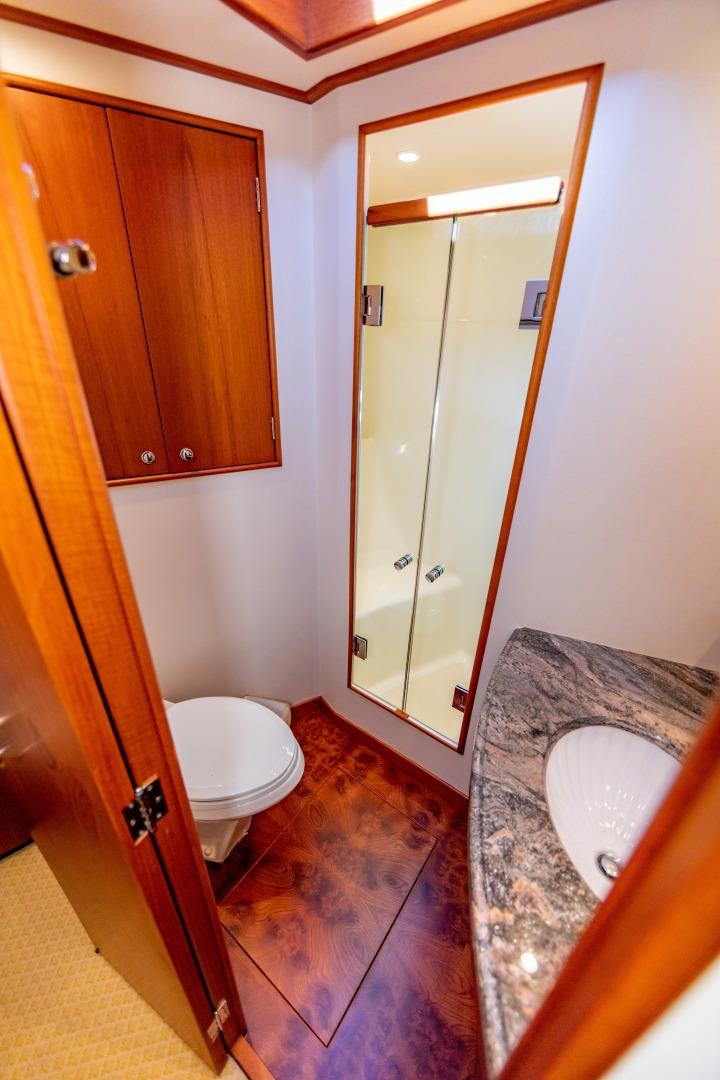 a bathroom with a sink and a toilet aboard WATASHEE Yacht for Sale