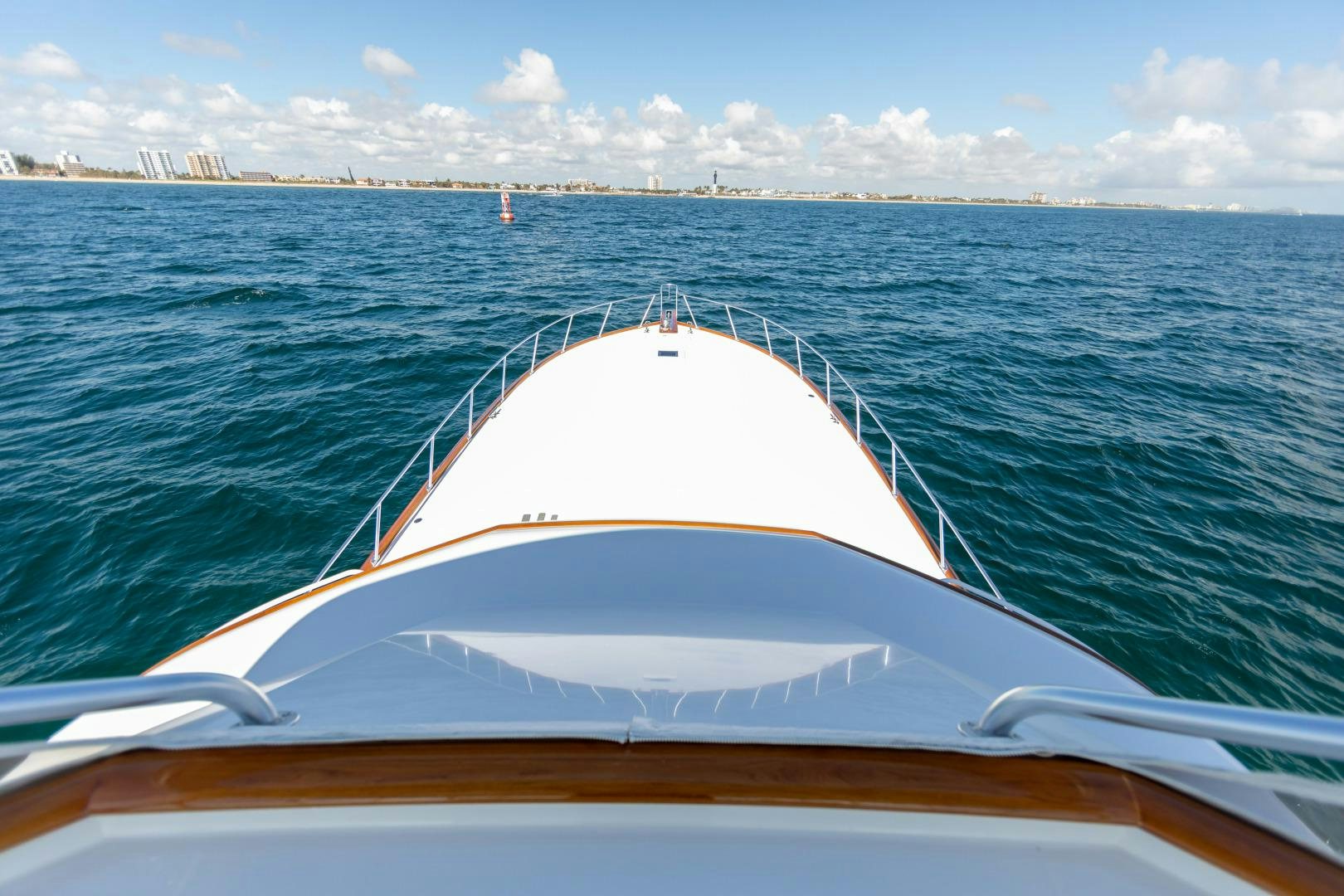 a white boat on the water aboard WATASHEE Yacht for Sale