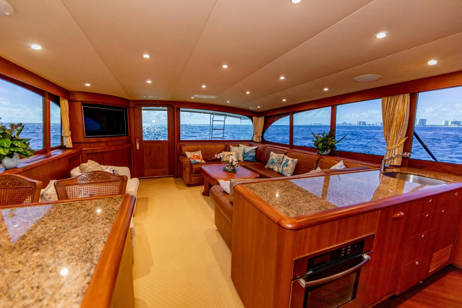 a large kitchen and living room aboard WATASHEE Yacht for Sale