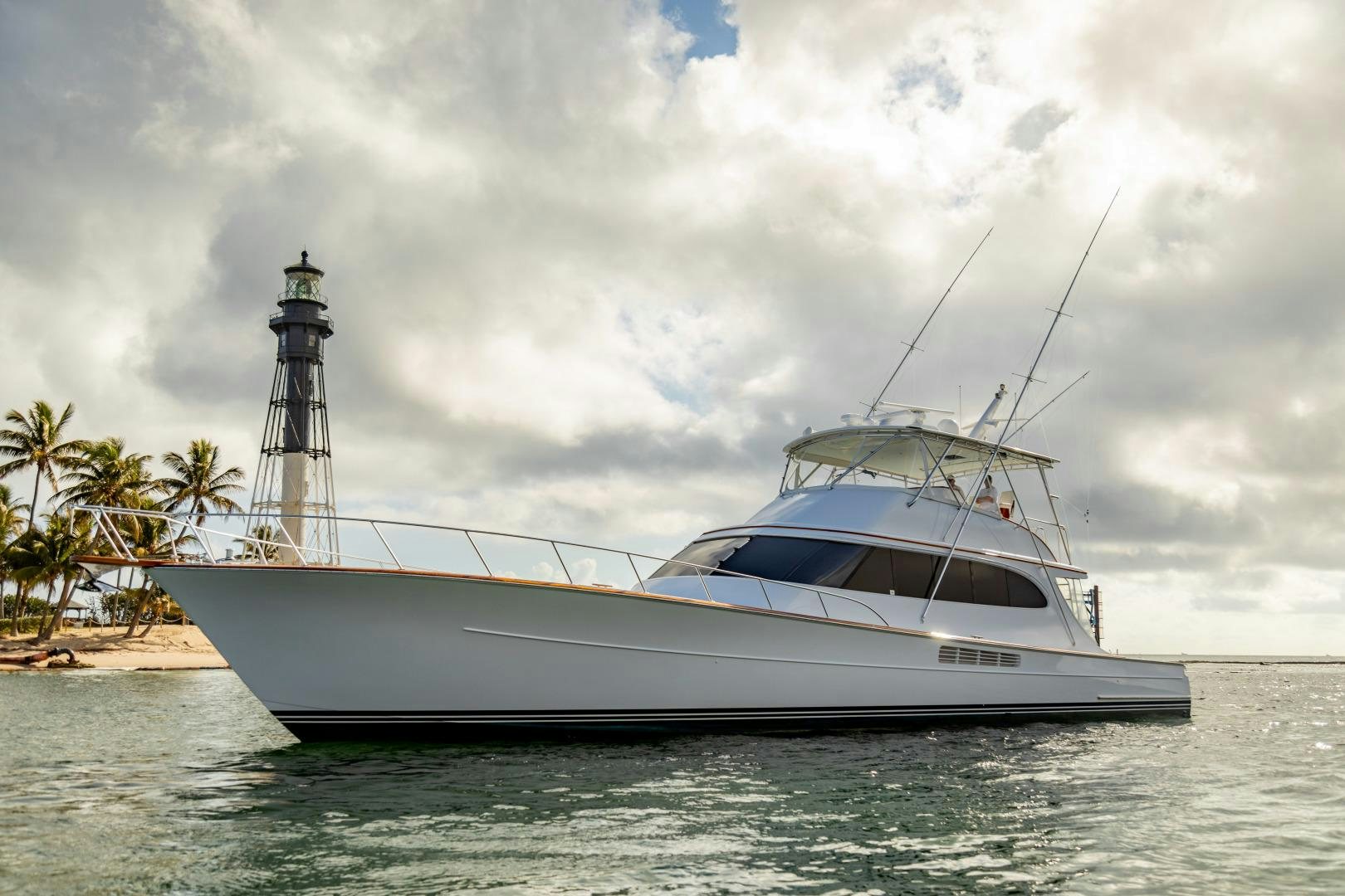 a white yacht in the water aboard WATASHEE Yacht for Sale