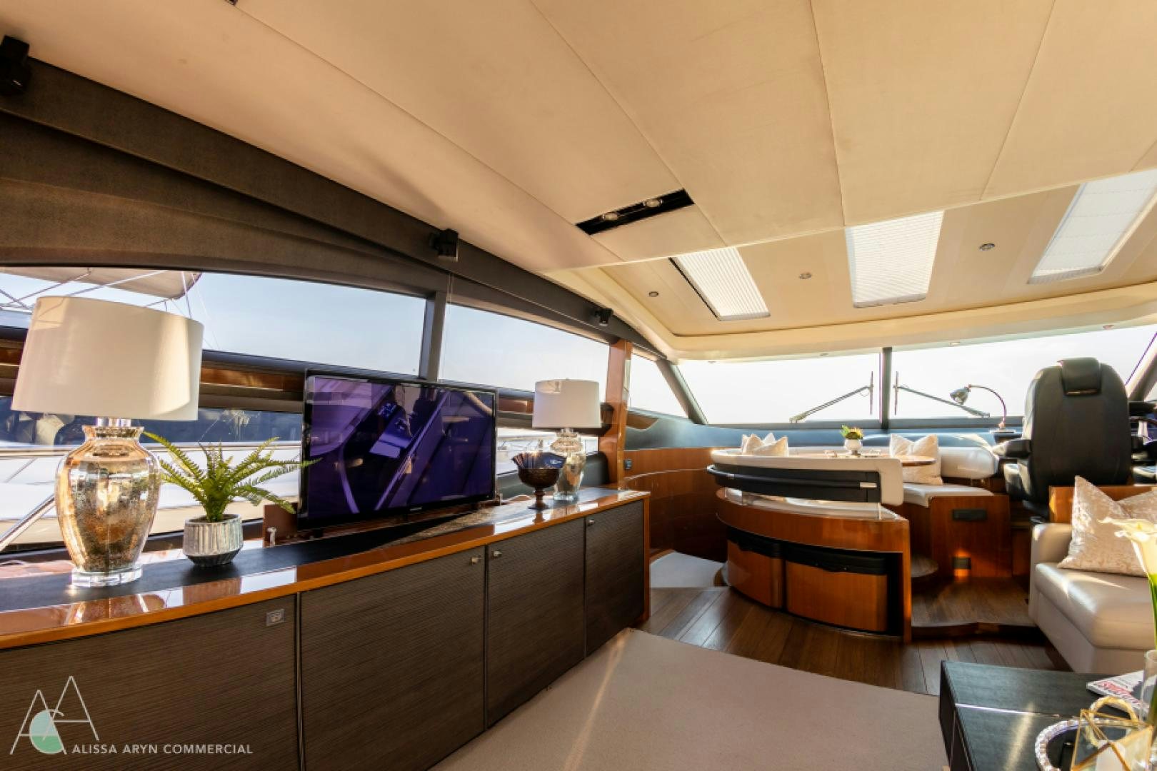 a room with a desk and a television aboard No Name Yacht for Sale